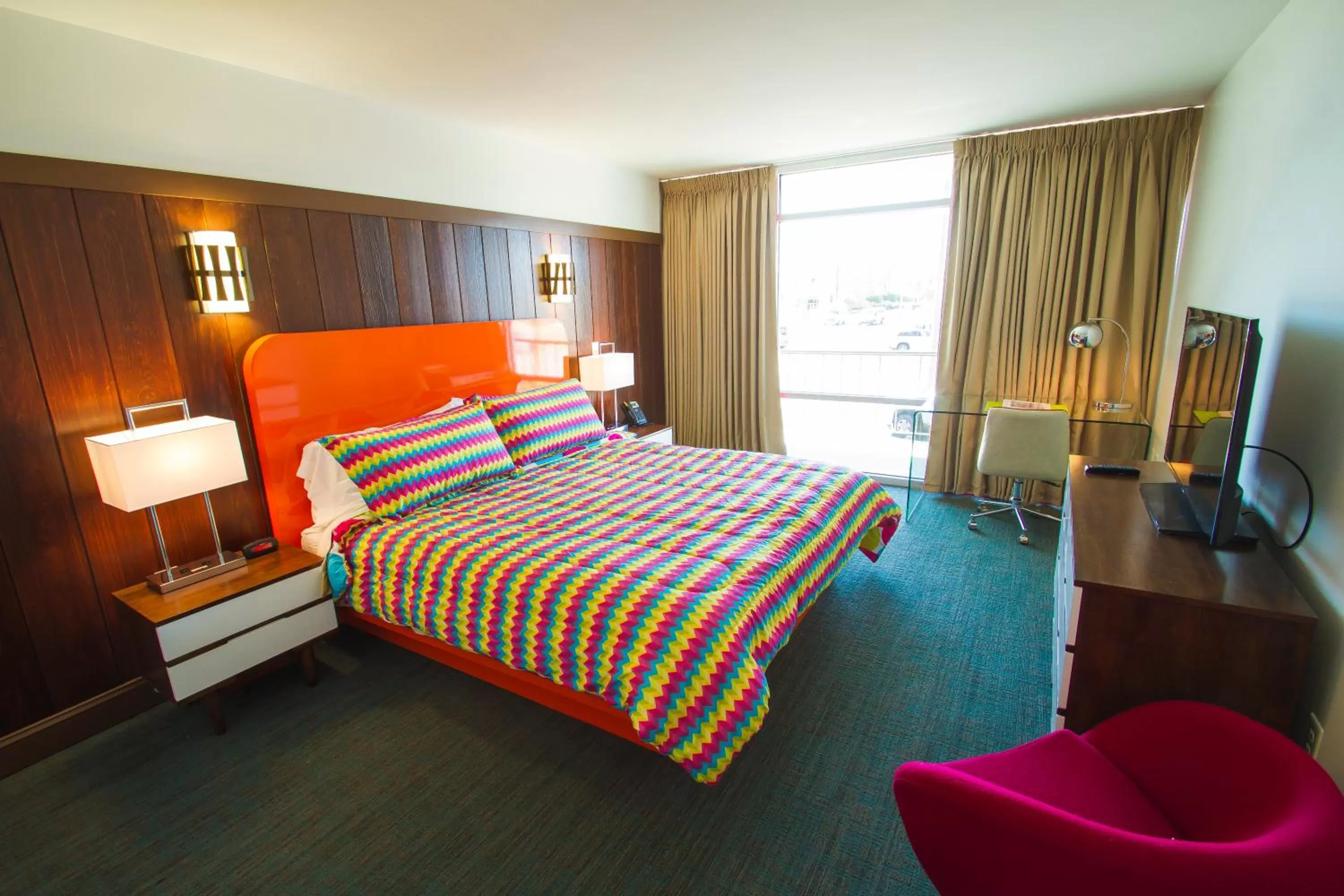 Bed in Mother Earth Motor Lodge