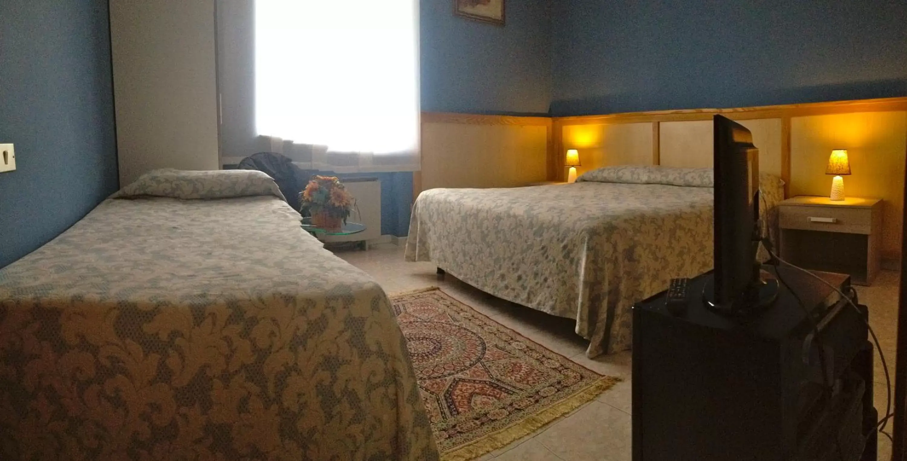 Quadruple Room with View in Hotel Monumento Quadruple Room with View in Hotel Monumento