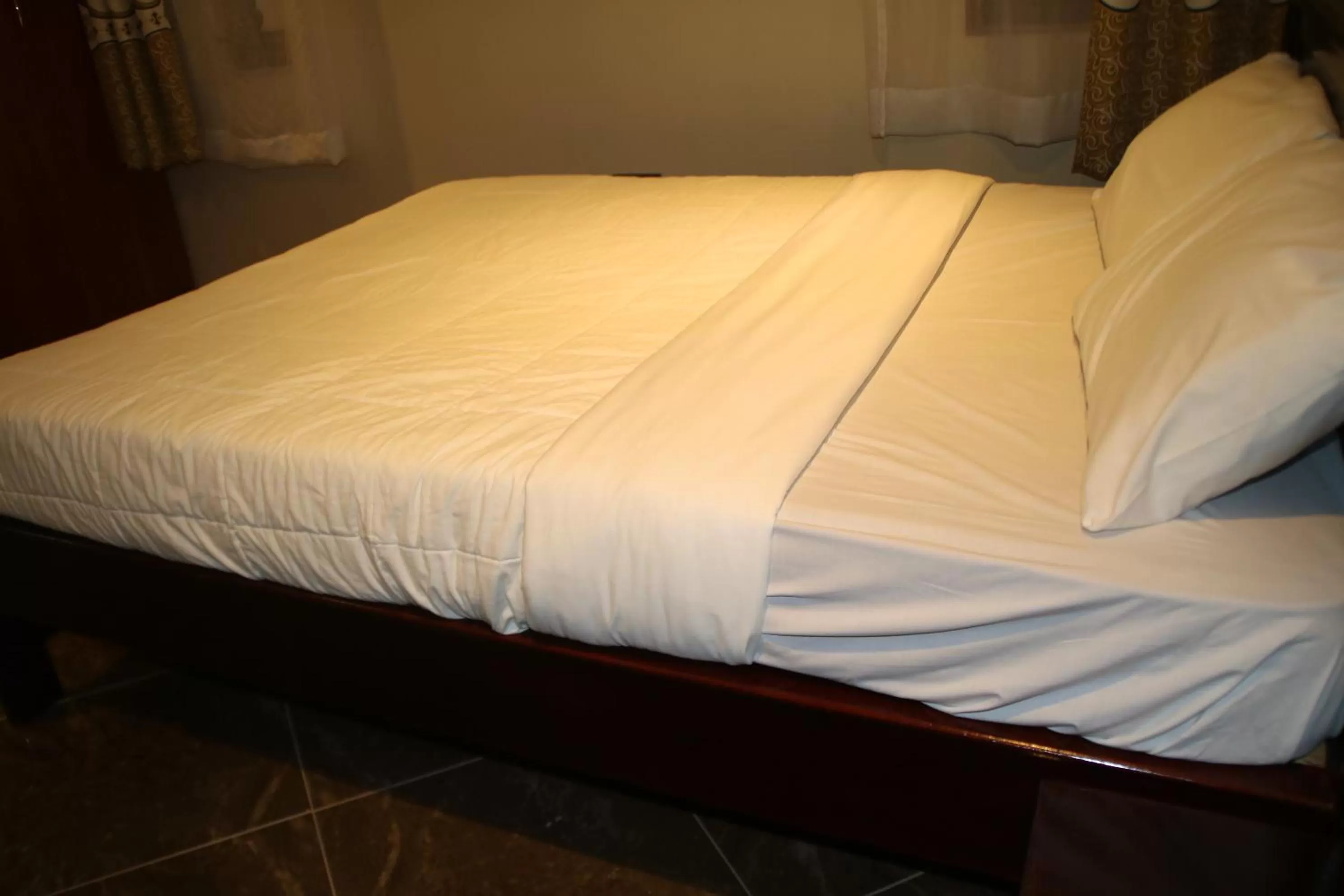 Bed in Acactus Hotel