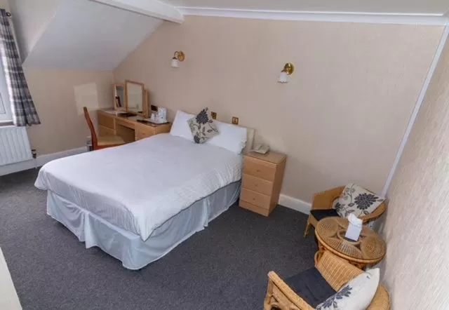 Bed in The Quorn Lodge Hotel