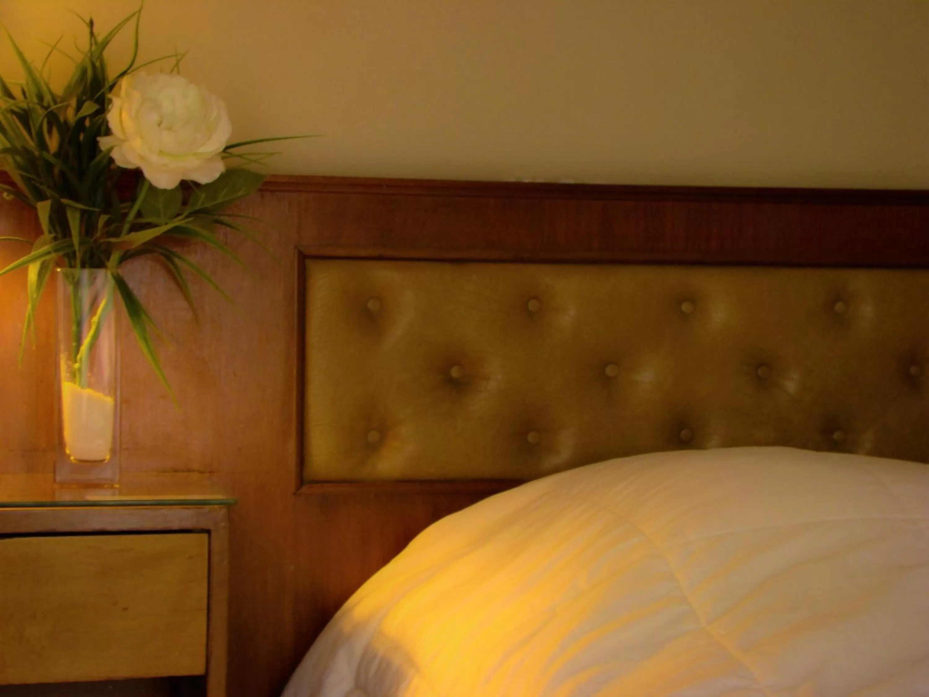 Bed in Petit Recoleta Suites