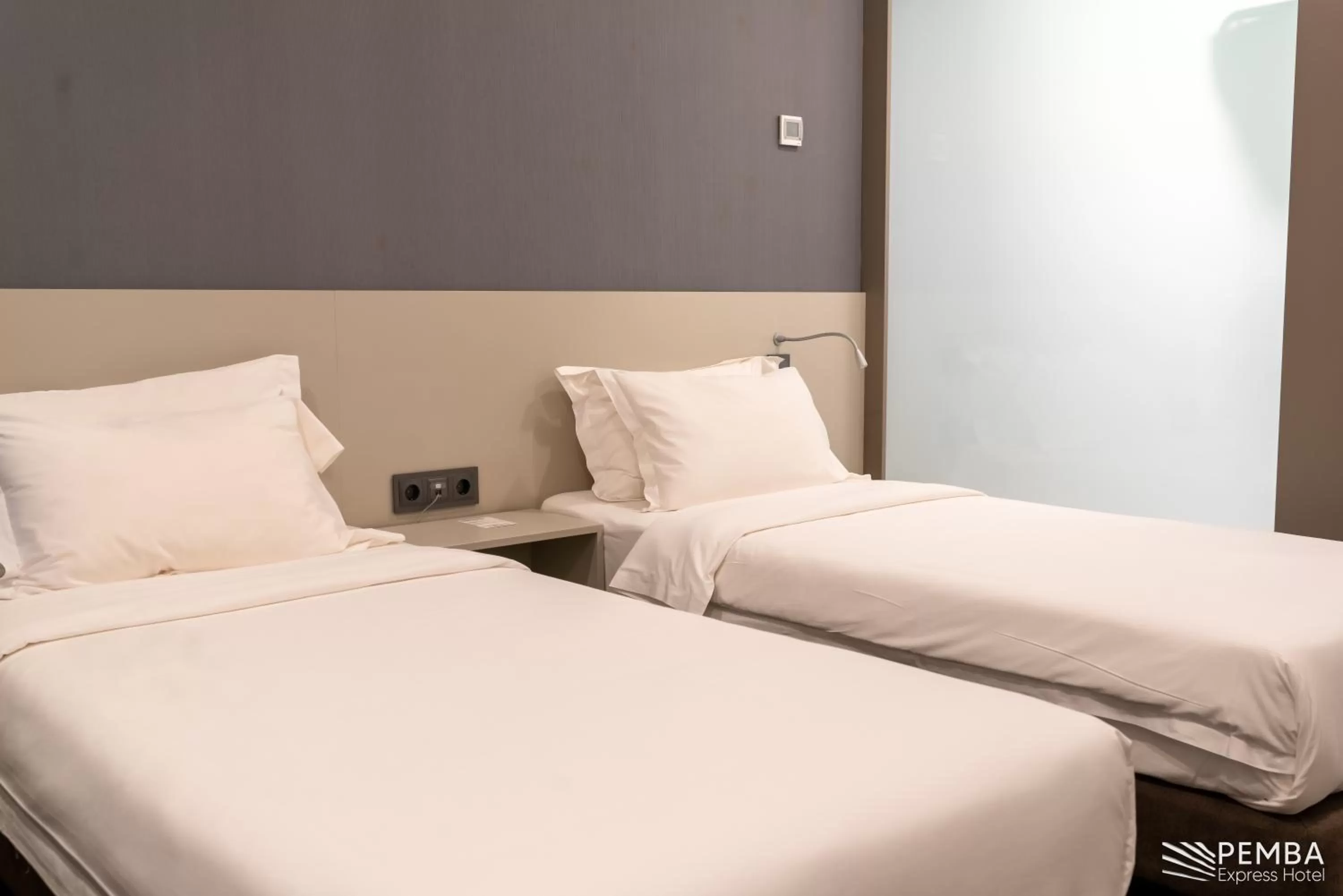 Decorative detail, Bed in Pemba Express Hotel