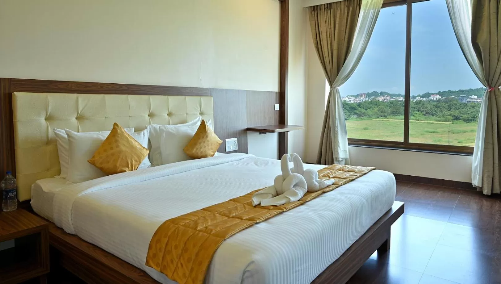 Bed in Hotel Laxmi Empire