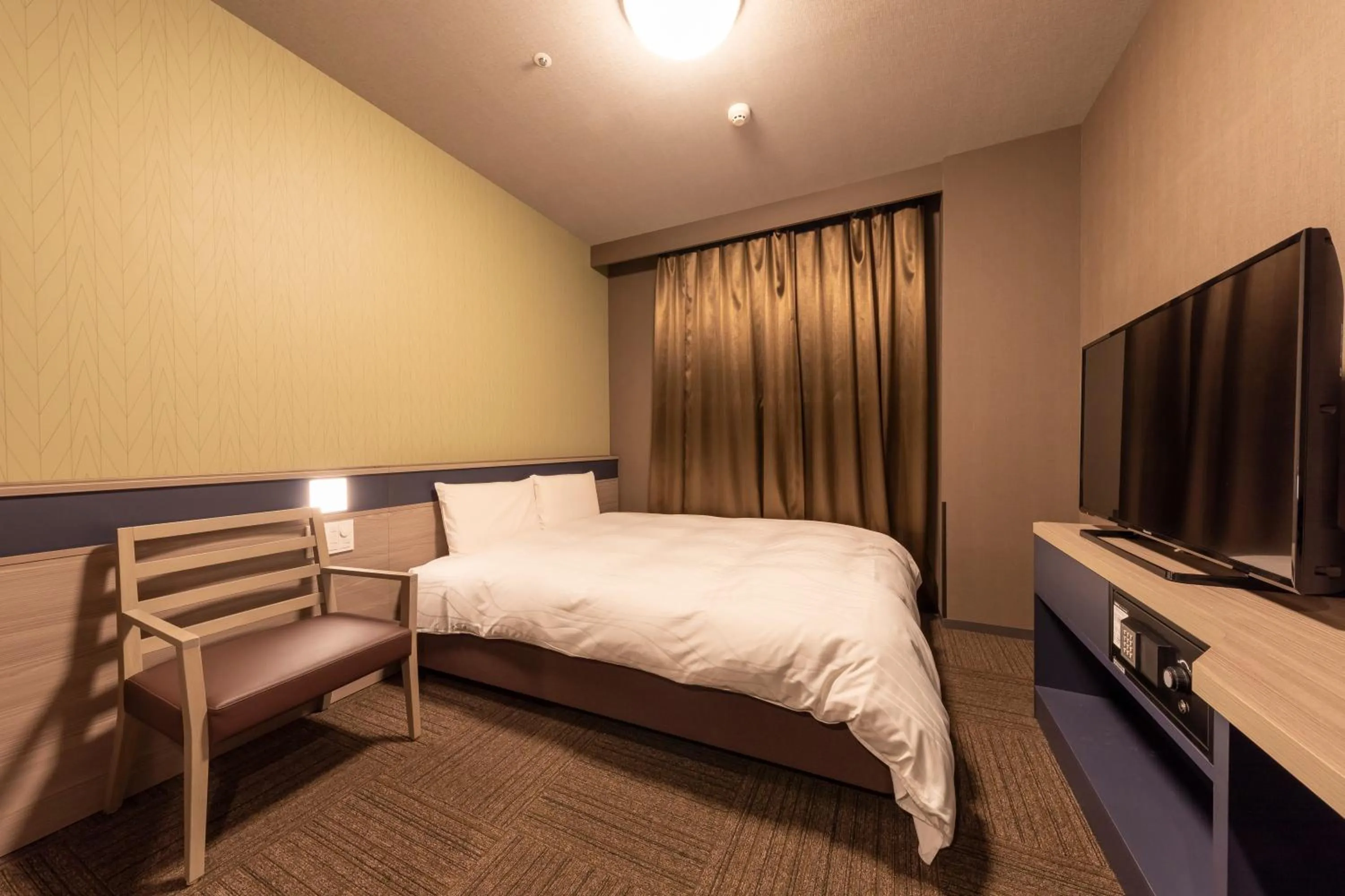 Bed in Dormy Inn Kawasaki Natural Hot Spring