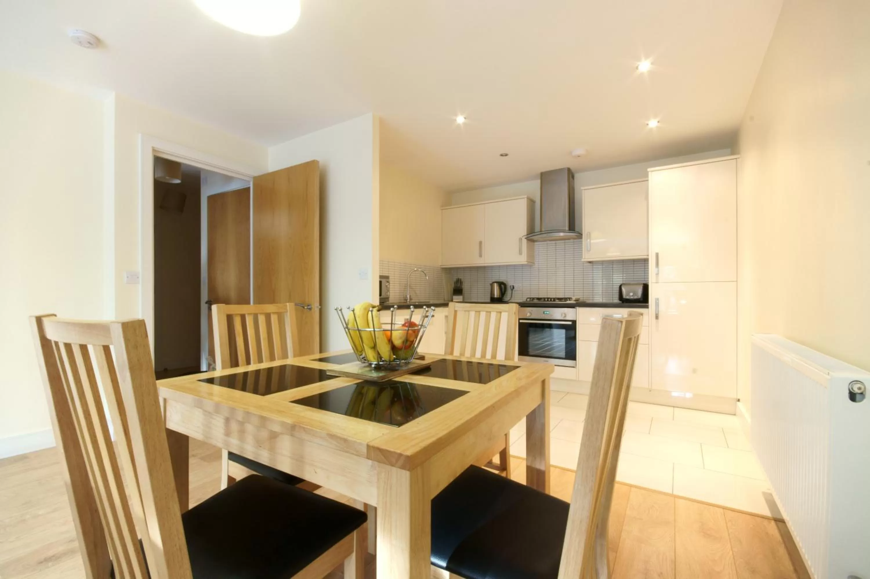 Dining area in Lodge Drive Serviced Apartments