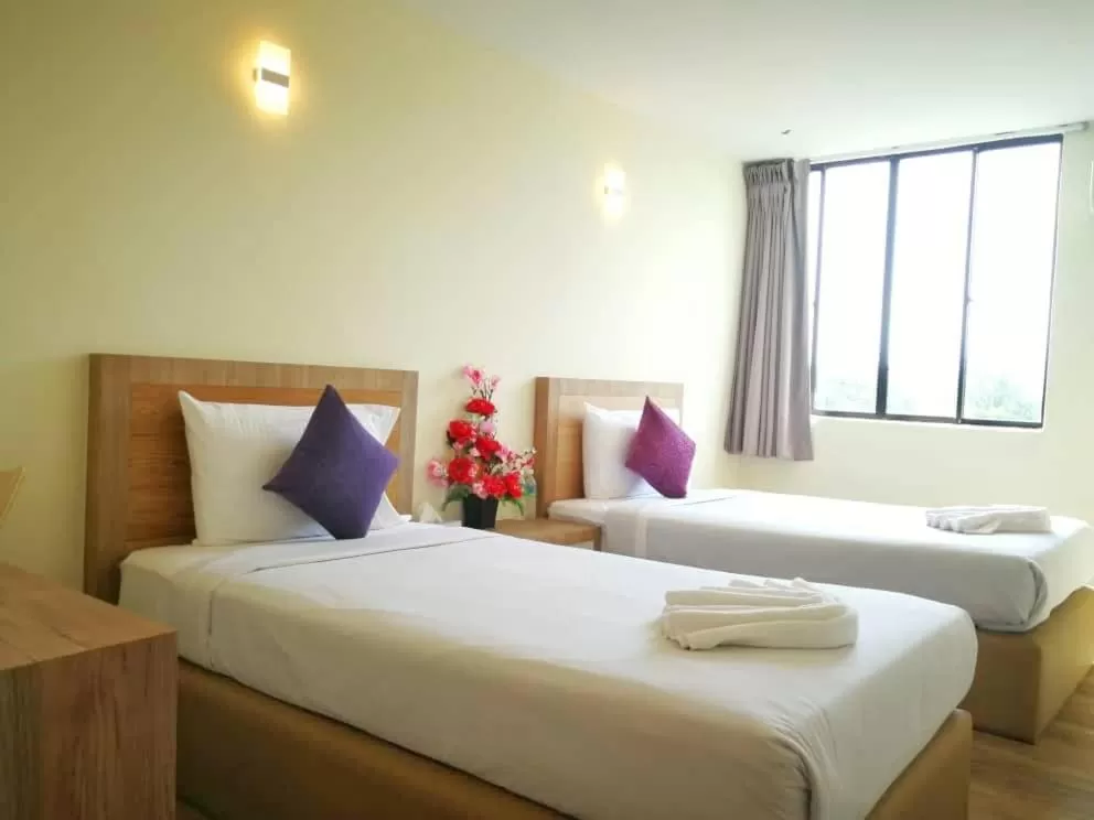 Bed in Merilton Hotel