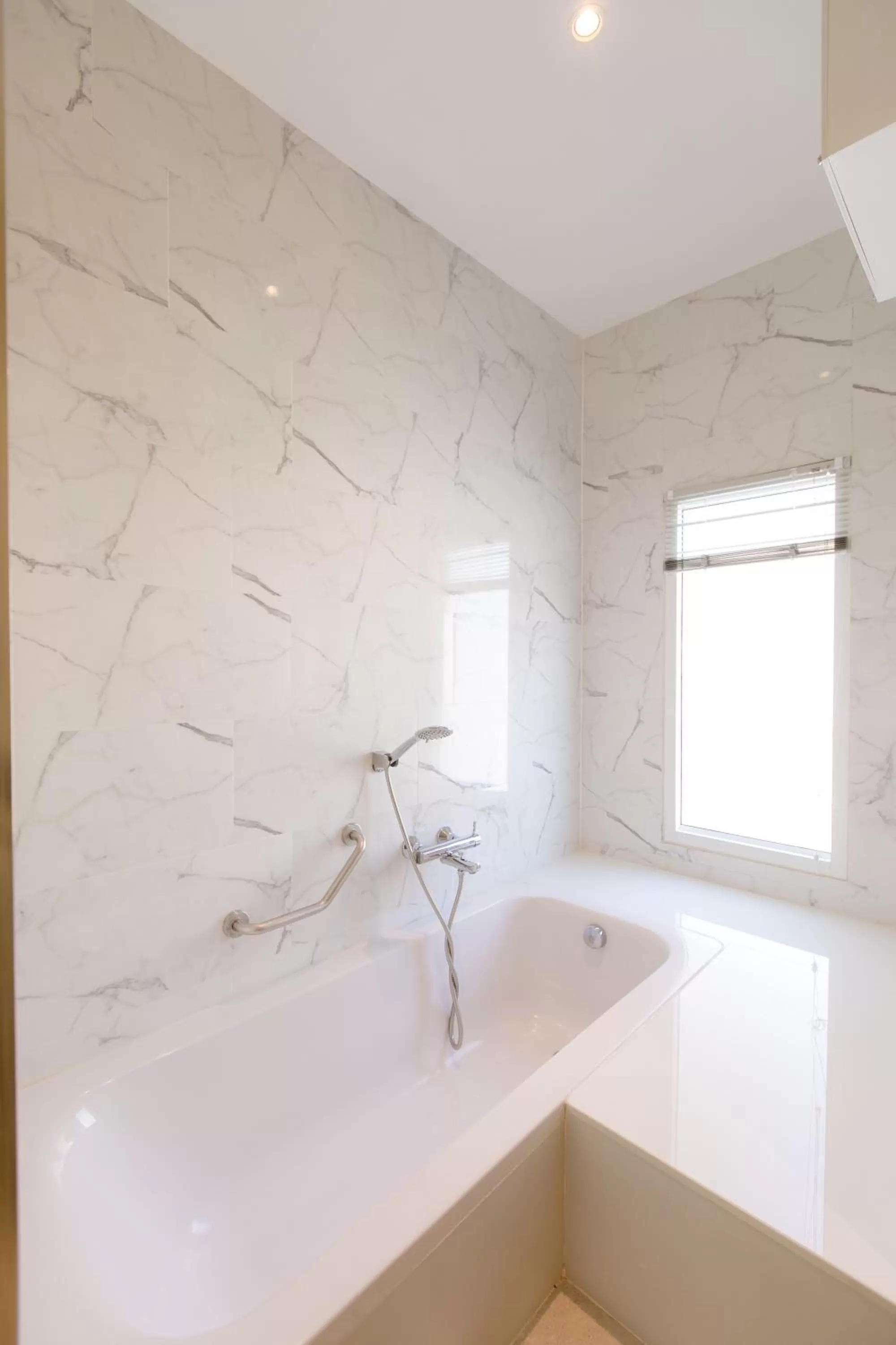 Bathroom in De Hug Hotel & Residence