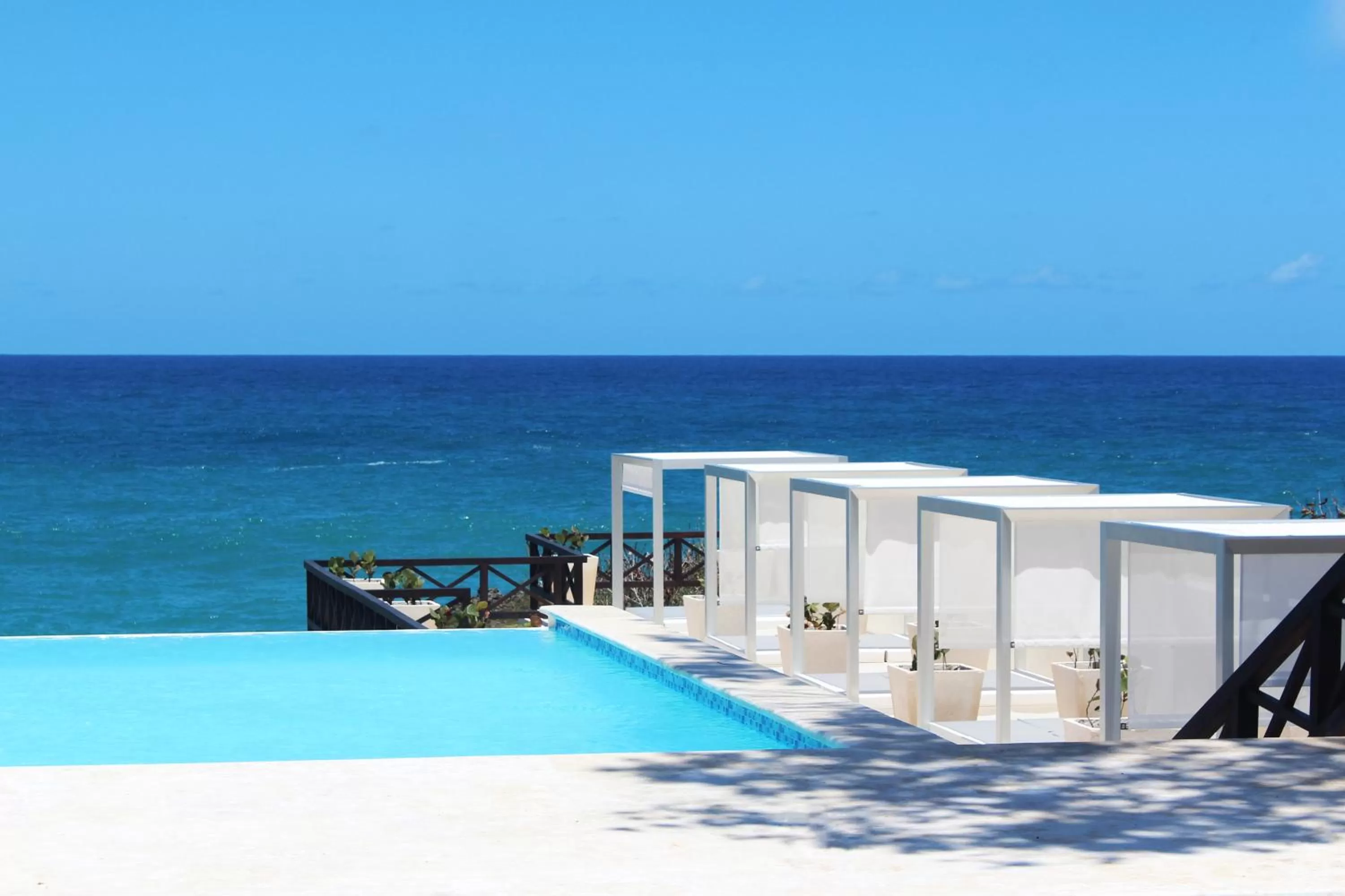 Restaurant/places to eat, Swimming Pool in Ocean Village Deluxe Resort & Spa