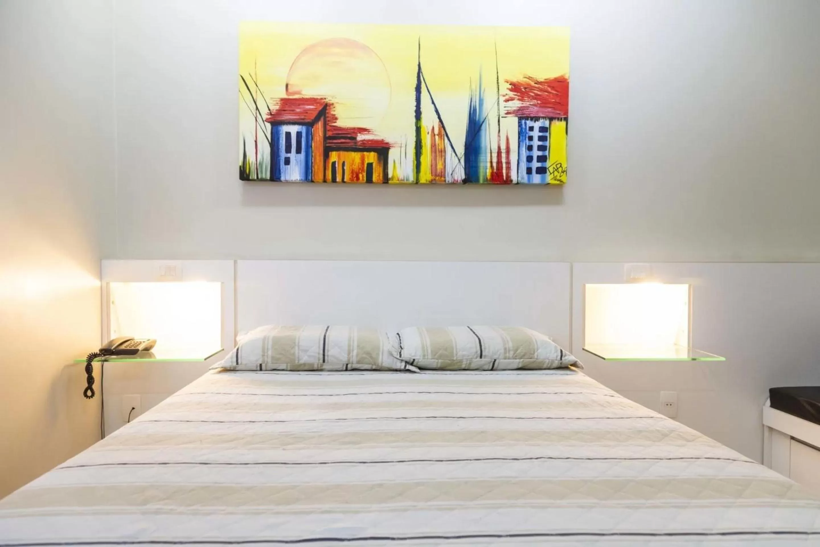 Bed in VOA Plazza Hotel