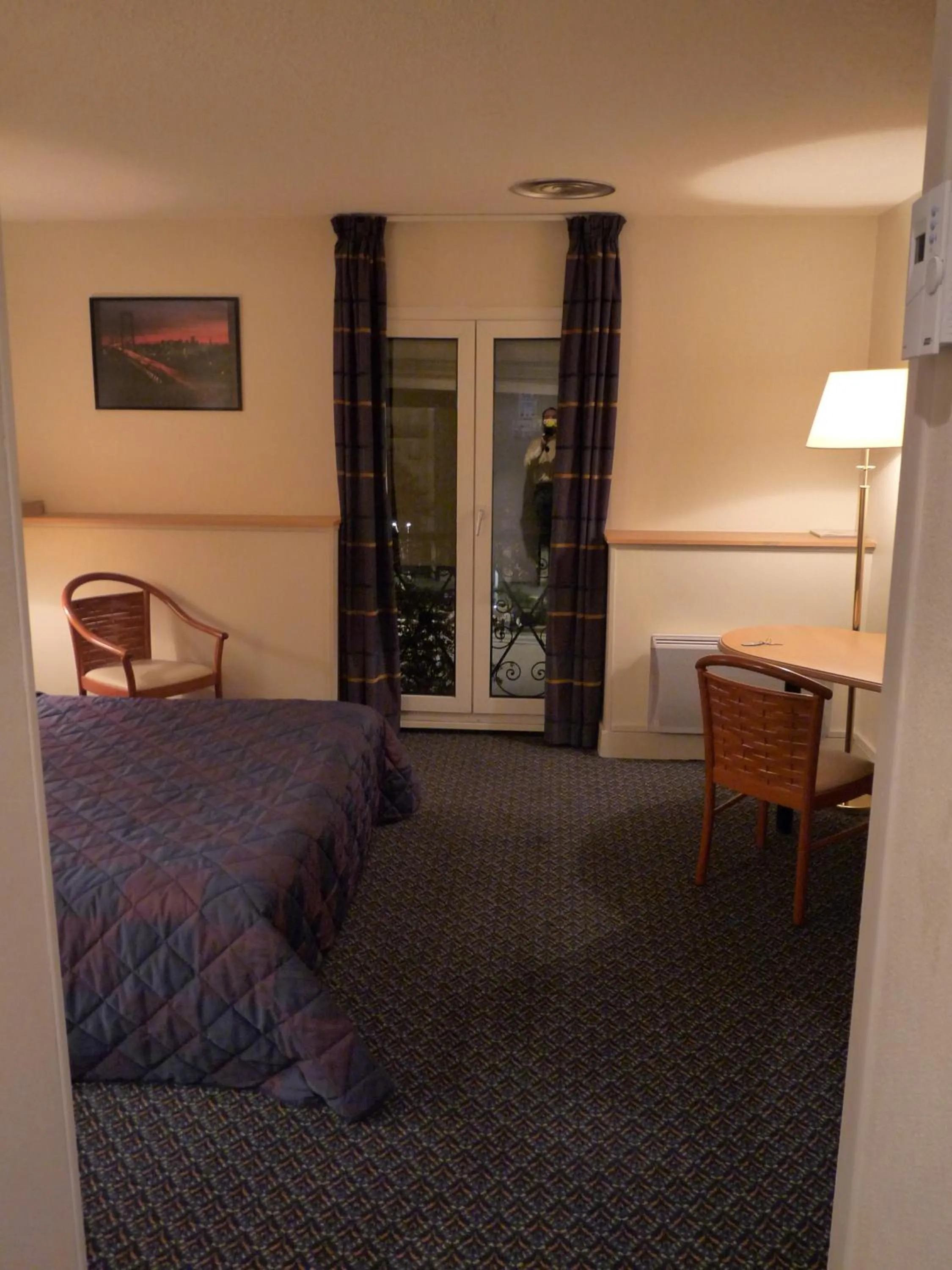 Bed in Hotel Le Bourbon Pau Centre