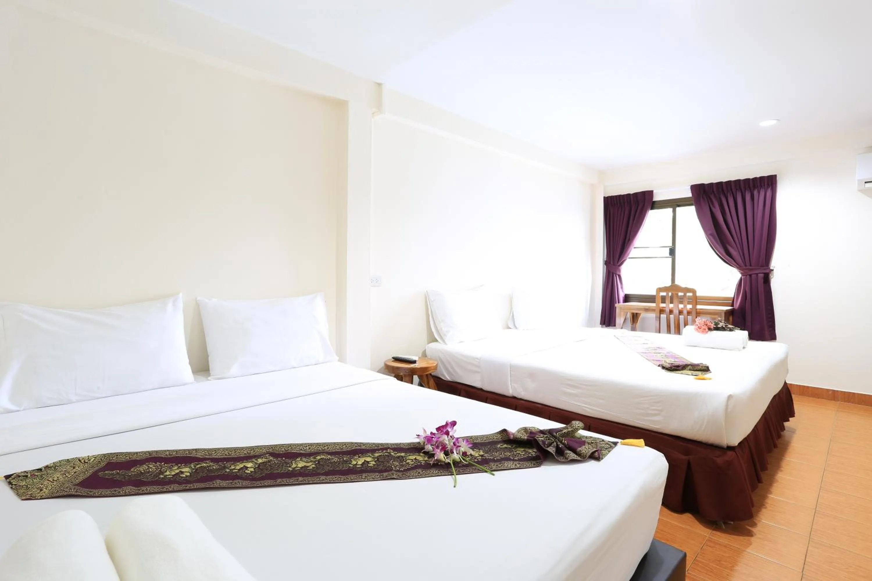Bed in The Siam Guest House - SHA Extra Plus