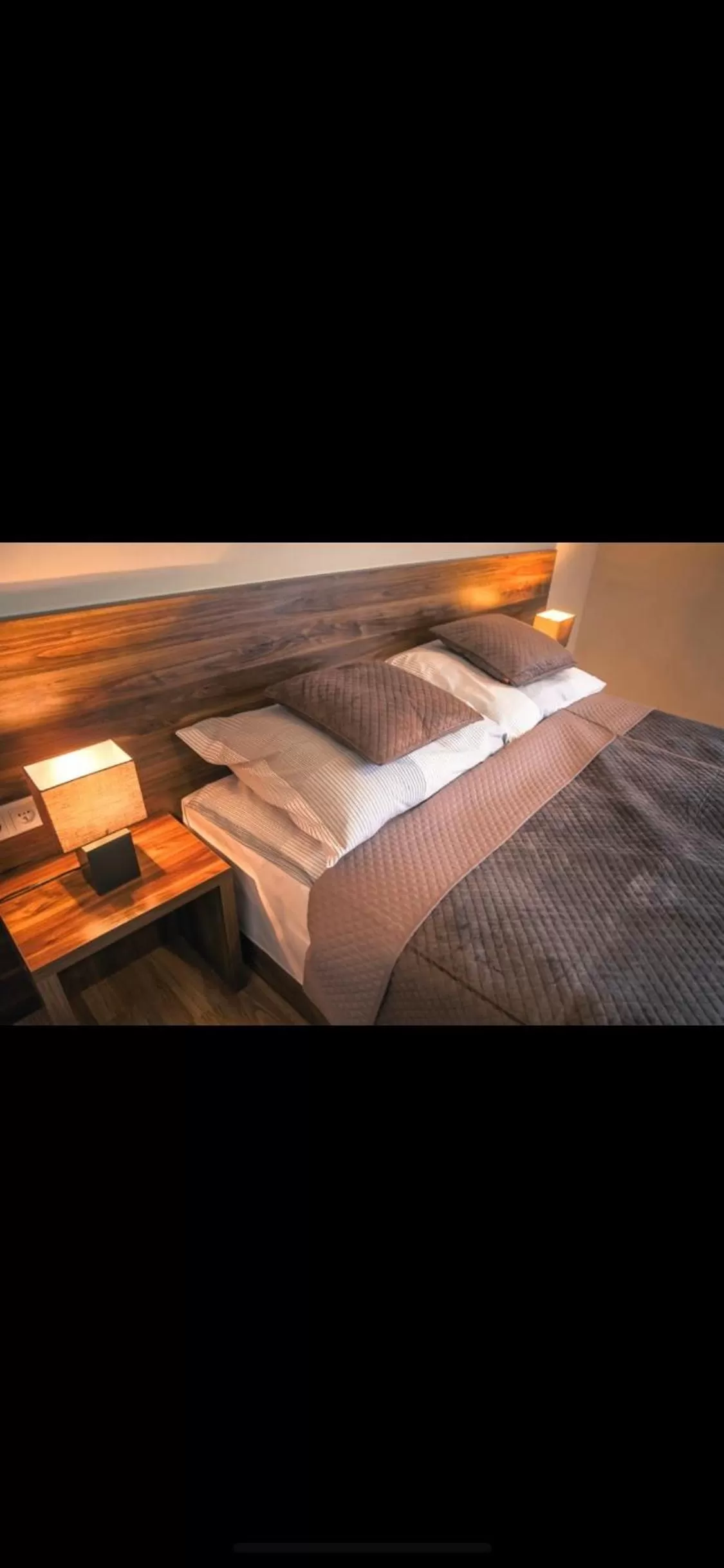 Bed in PIANO CAFE b&b