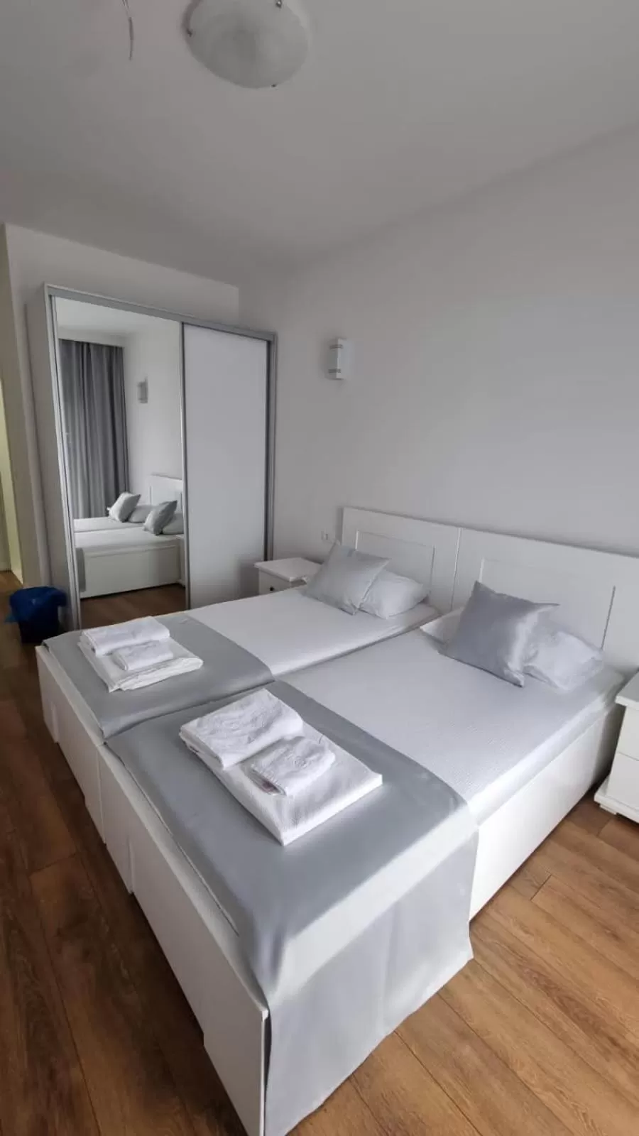 Bed in Elan Luxury Apartments & Rooms