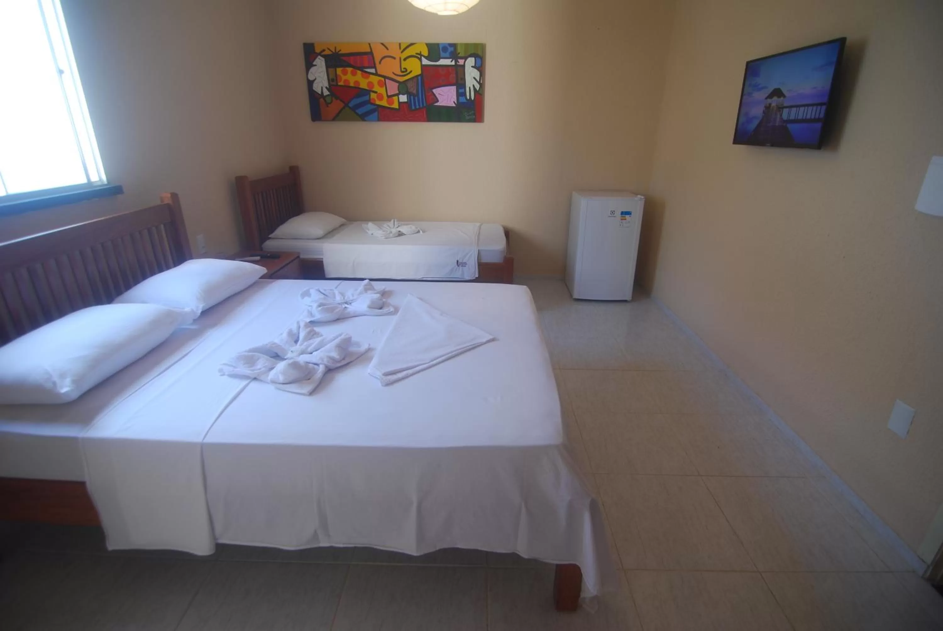 Bed in Refúgio Pousada Fortaleza