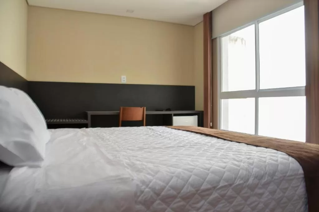 Bed in M Tower Hotel