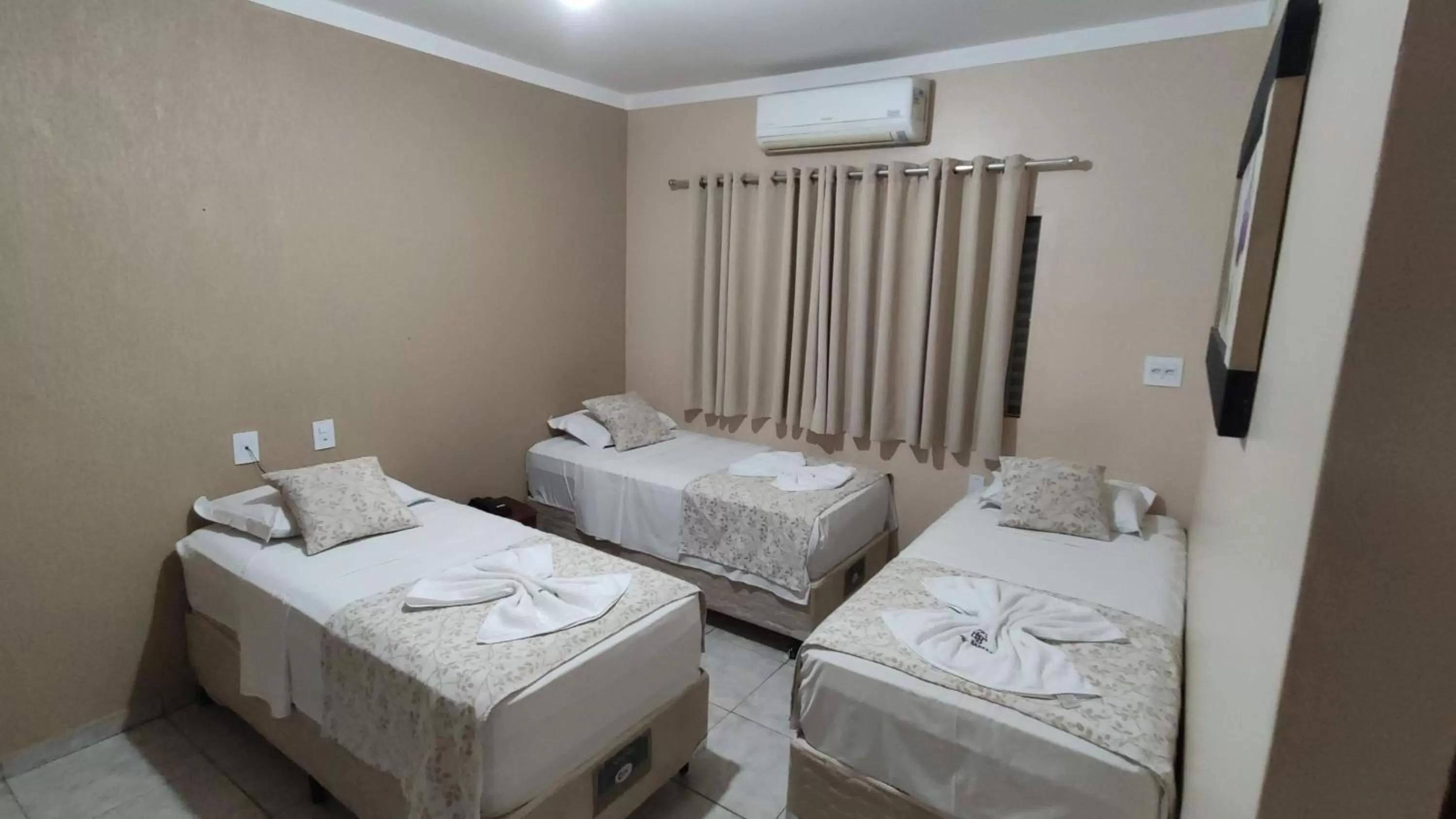 Bed in Hotel Barretos