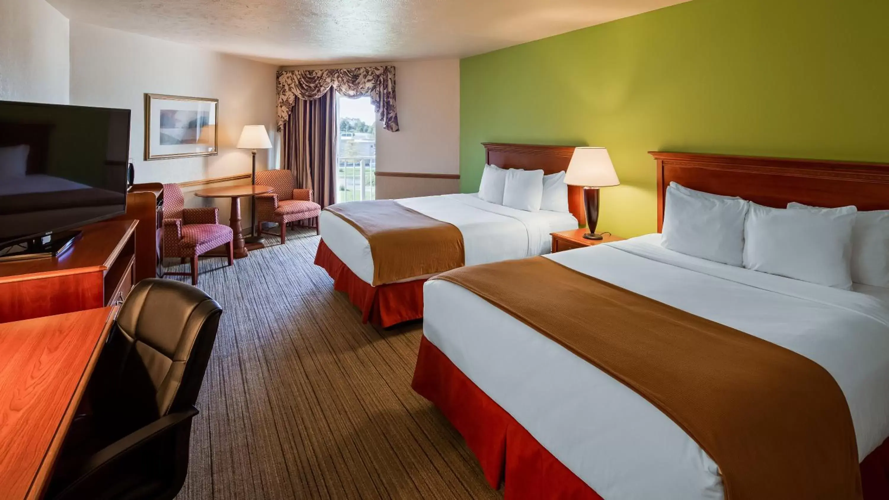 Queen Room with Two Queen Beds and Bath Tub - Disability Access in Apple Tree Inn; SureStay Collection by Best Western Queen Room with Two Queen Beds and Bath Tub - Disability Access in Apple Tree Inn; SureStay Collection by Best Western
