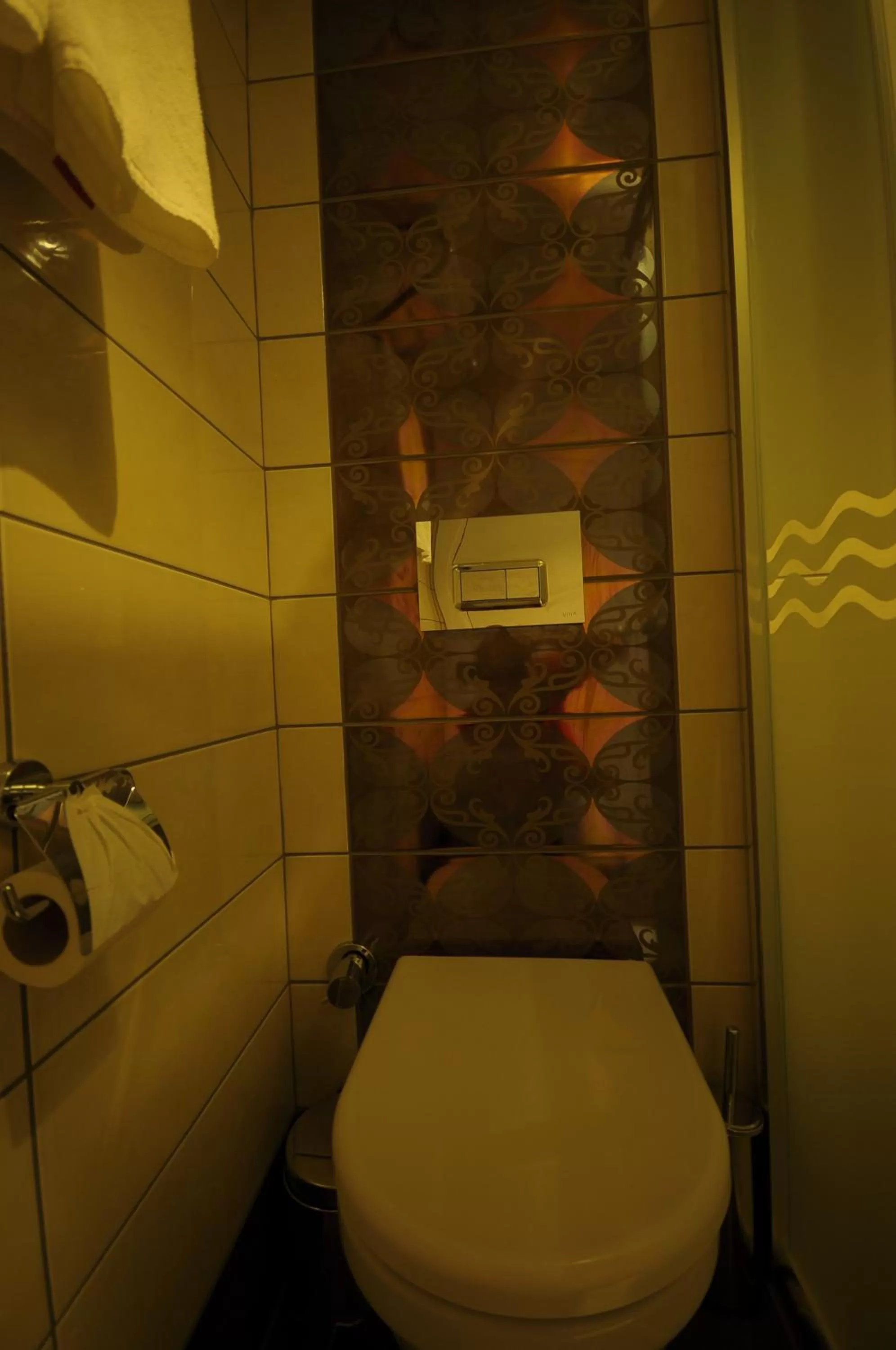 Toilet in Aura Boutique Hotel