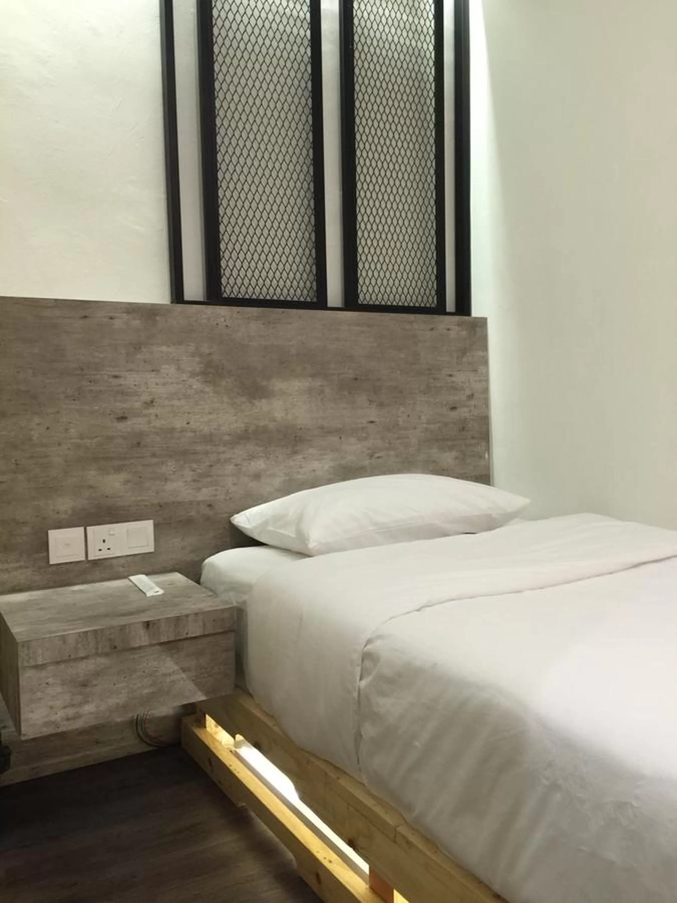 Bed in The Oikos Hotel