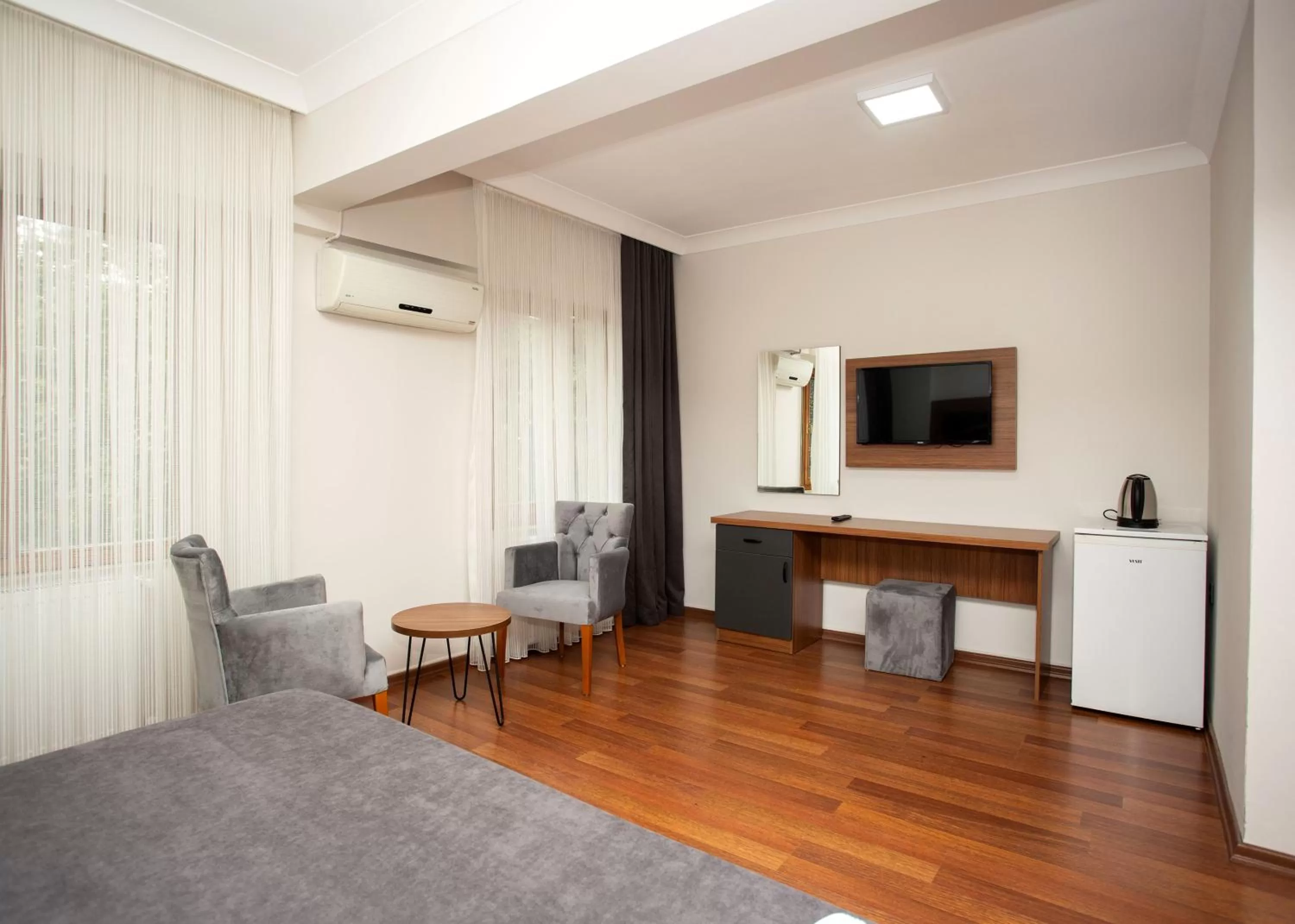 TV and multimedia in Türkler Suite Hotel