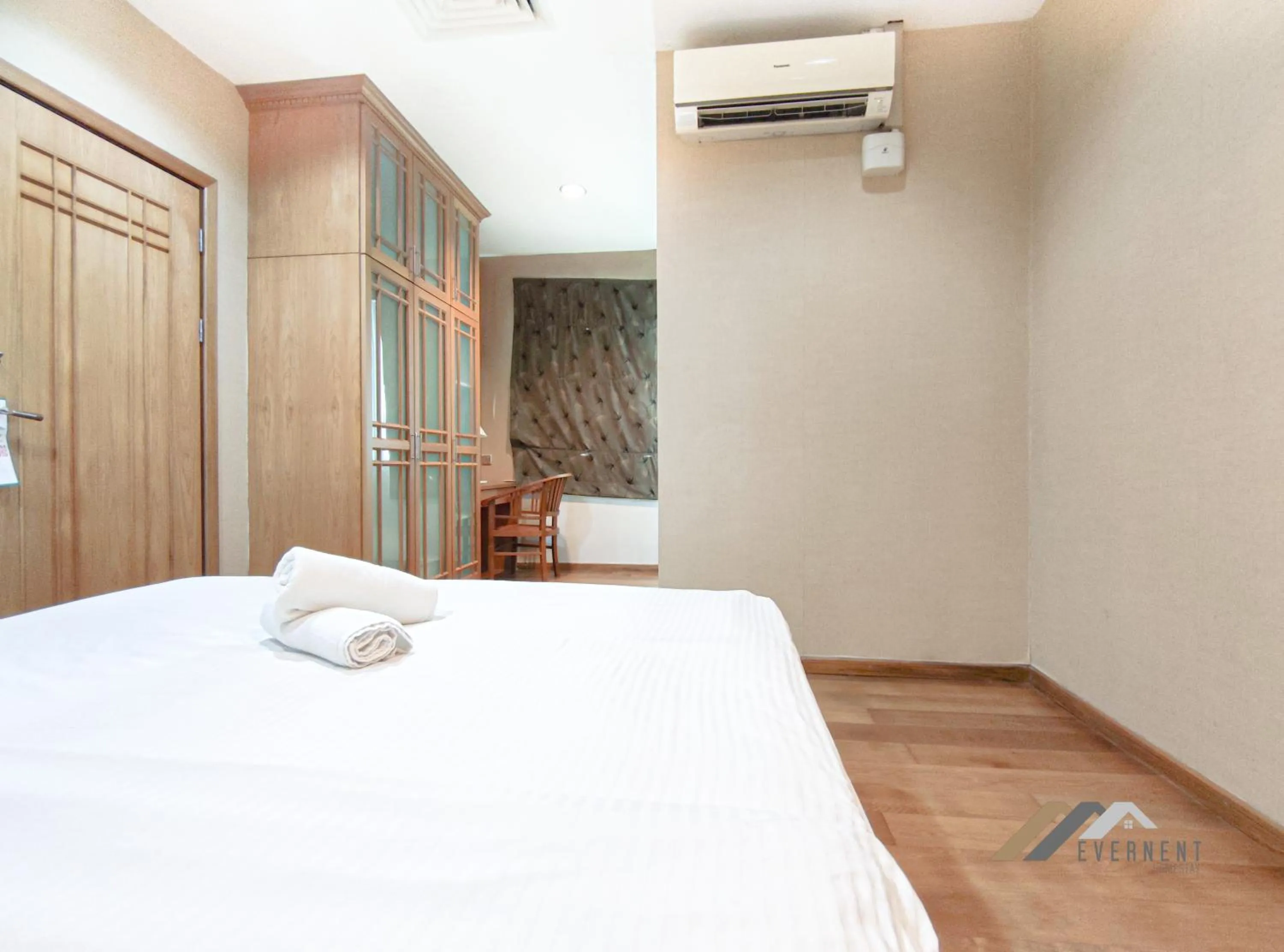 Bed in Mciti Suites by Evernent