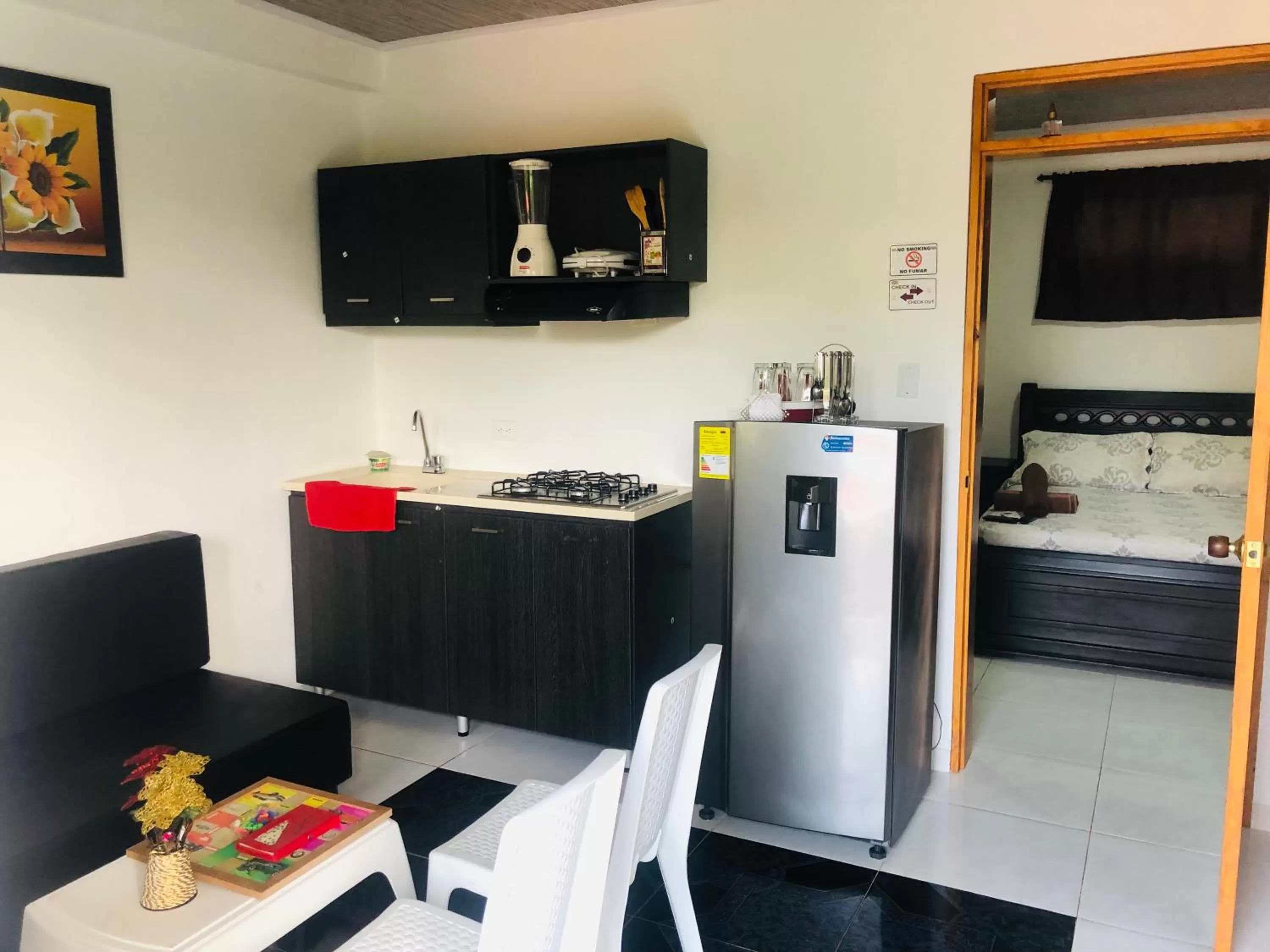 Kitchen or kitchenette, TV/Entertainment Center in Apartamento Miss Brigida