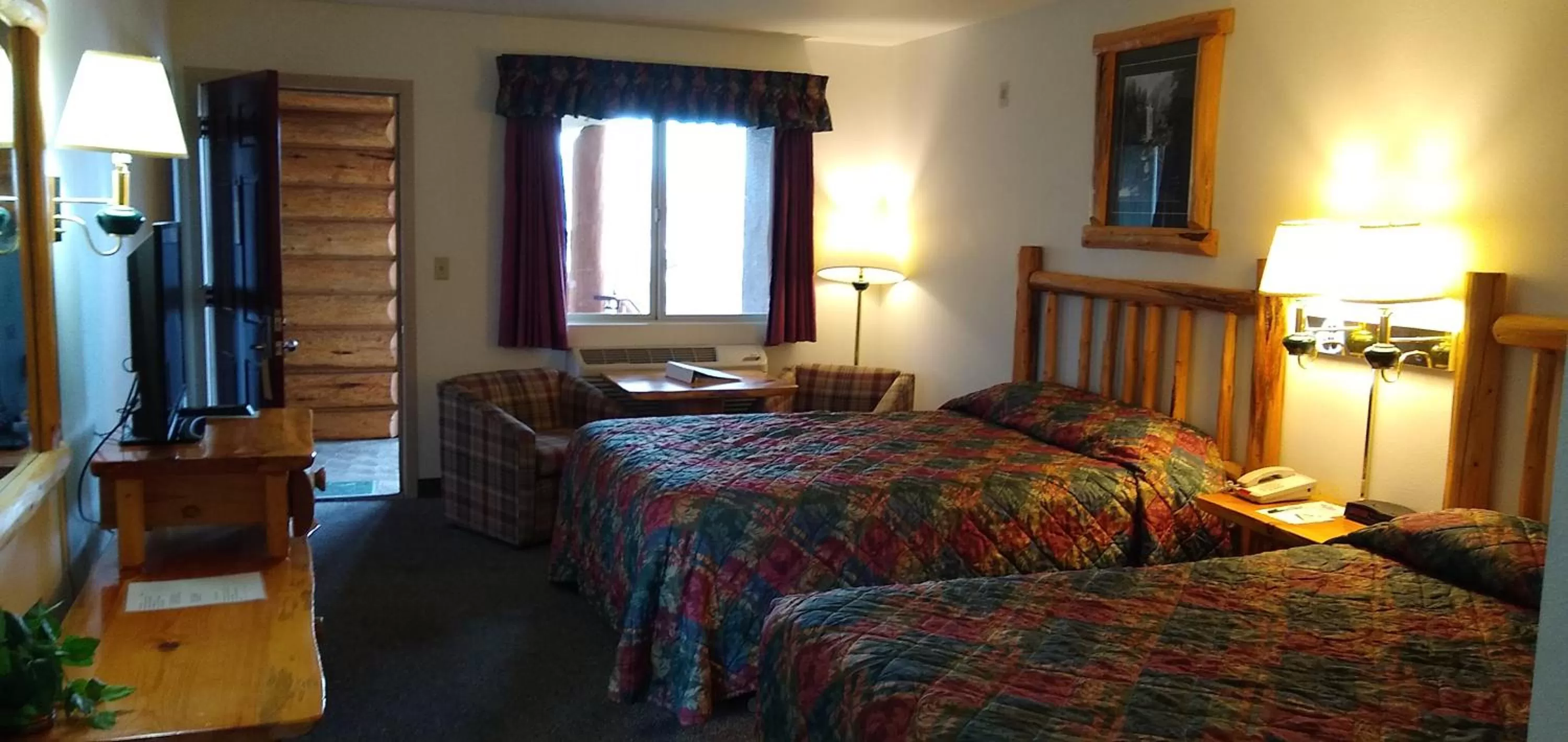 Bed in Ponderosa Motel