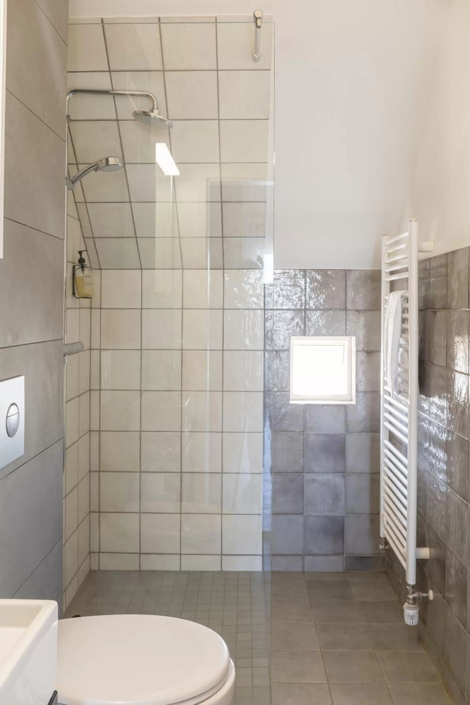 Bathroom in Saga Studios by Heimaleiga