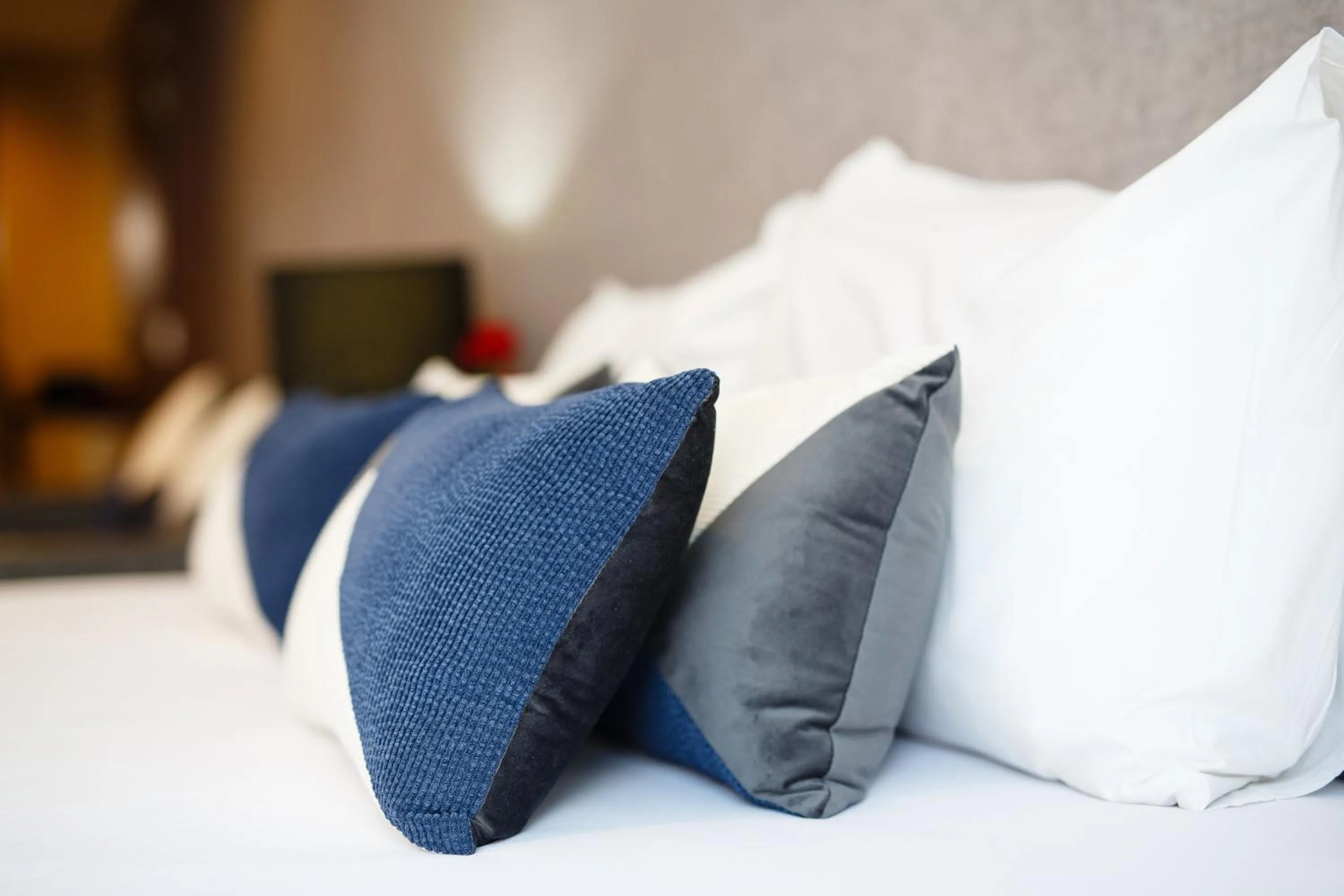 Bed in Platinum Hotel and Apartments