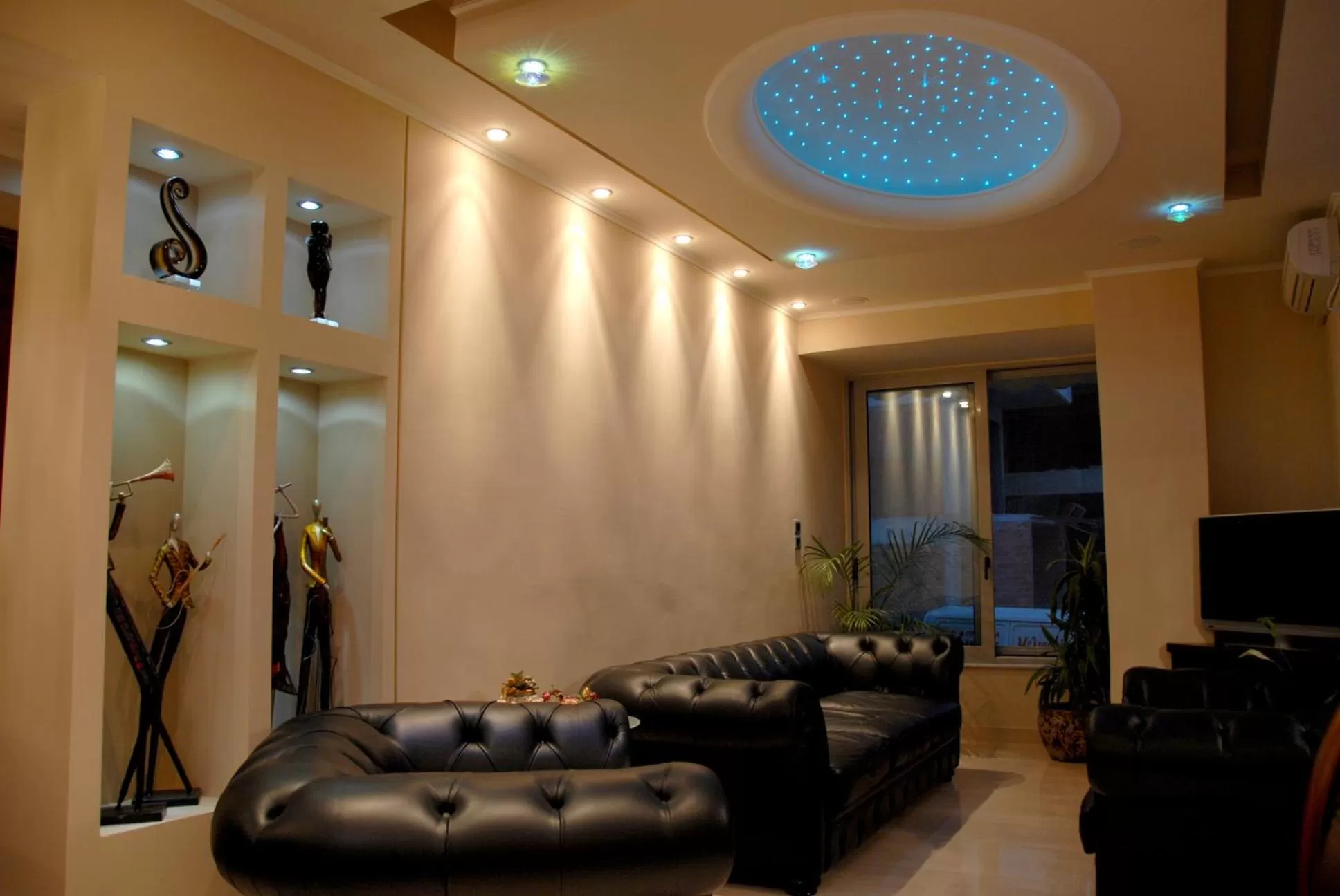 Communal lounge/ TV room in Studios Asteria