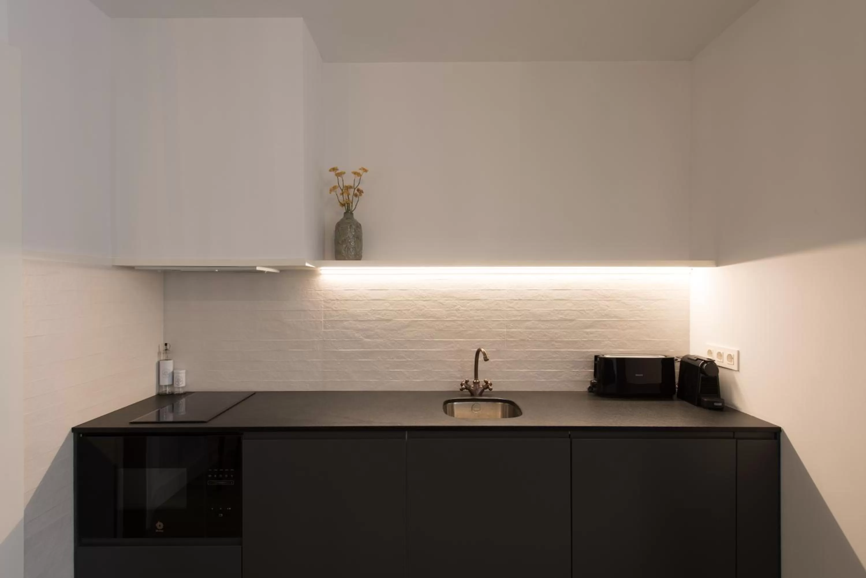 Kitchen or kitchenette in Santa Catalina Suites Gijón