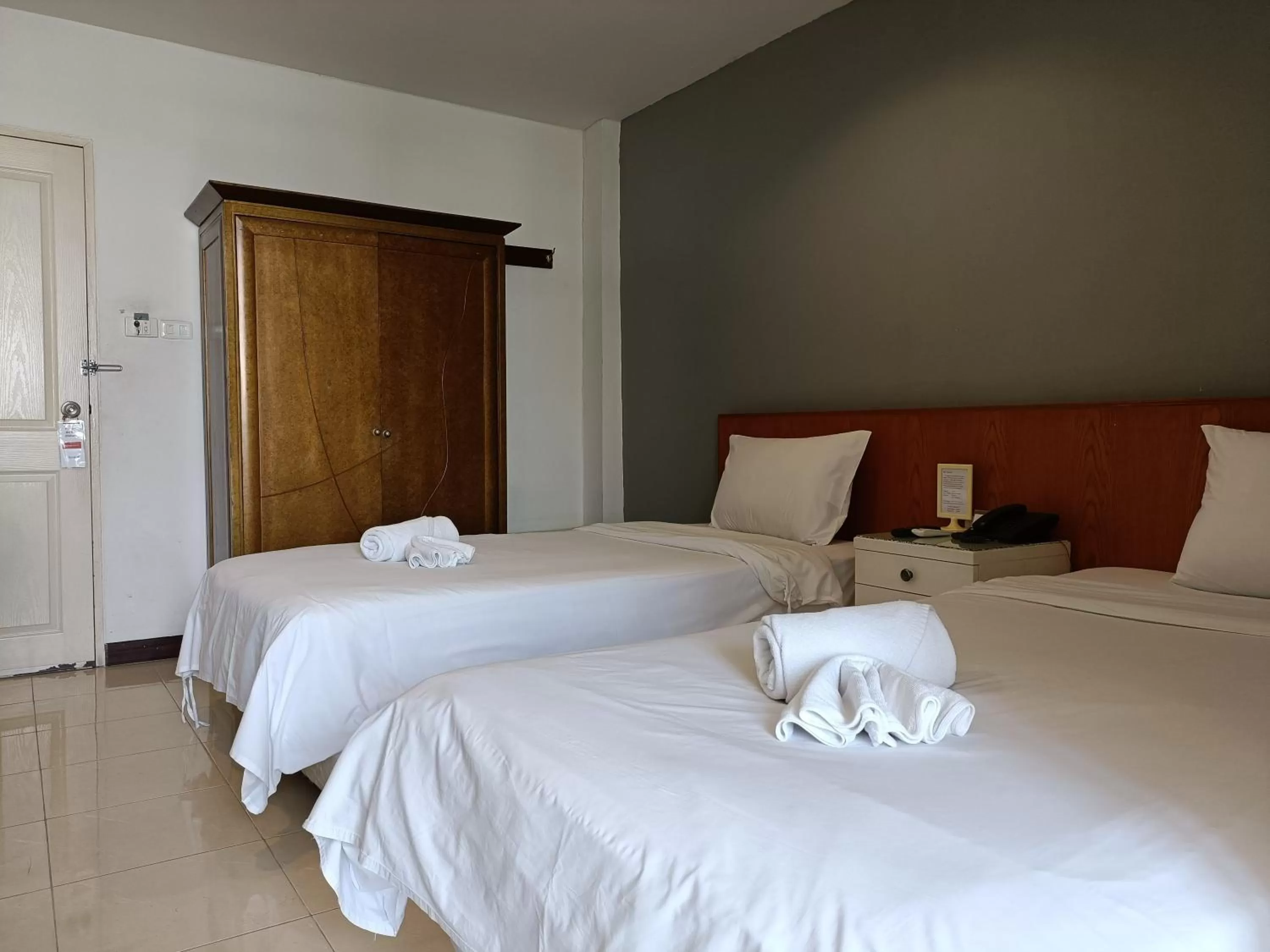 Bed in JL Bangkok Hotel