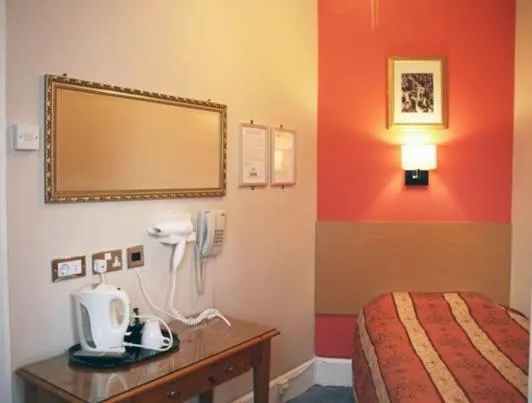 Bed in The Grapevine Hotel