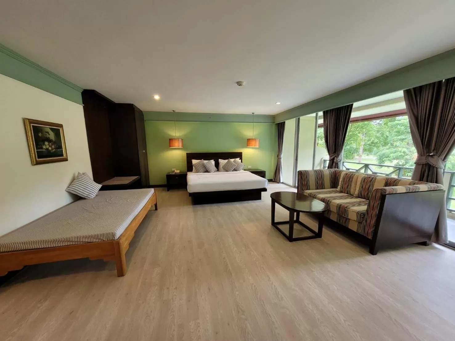 Photo of the whole room, Bed in Aekpailin River Kwai Resort