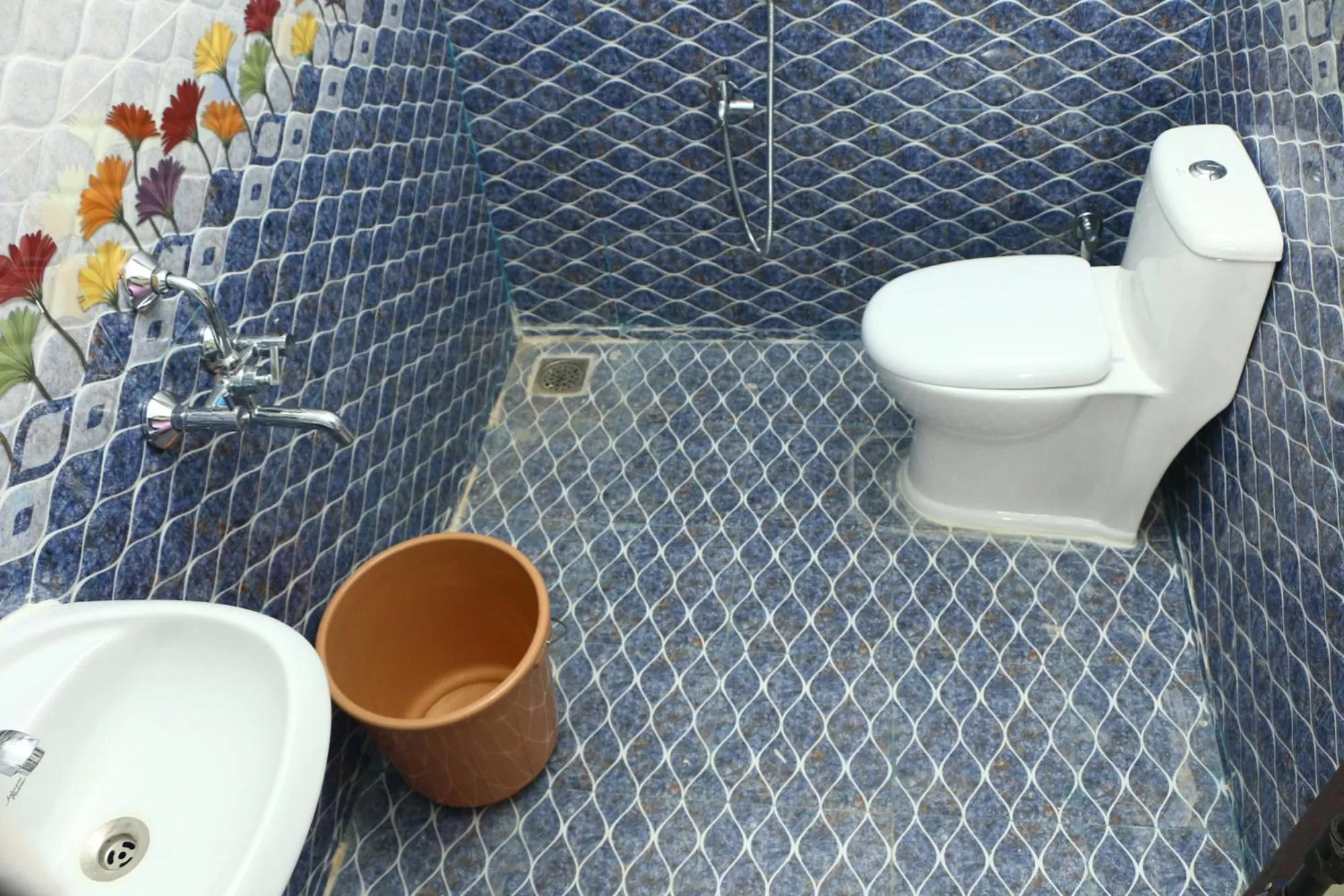 Toilet, Bathroom in Bluetique Beach House