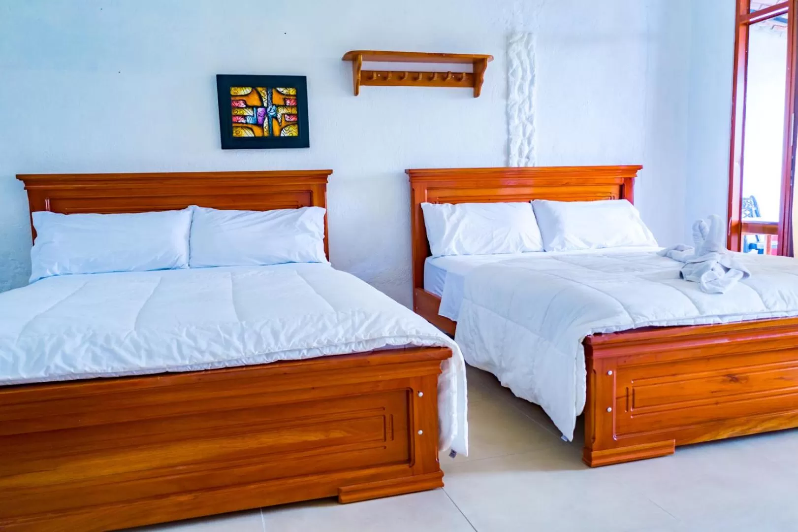 Bed in Royal Galápagos Inn