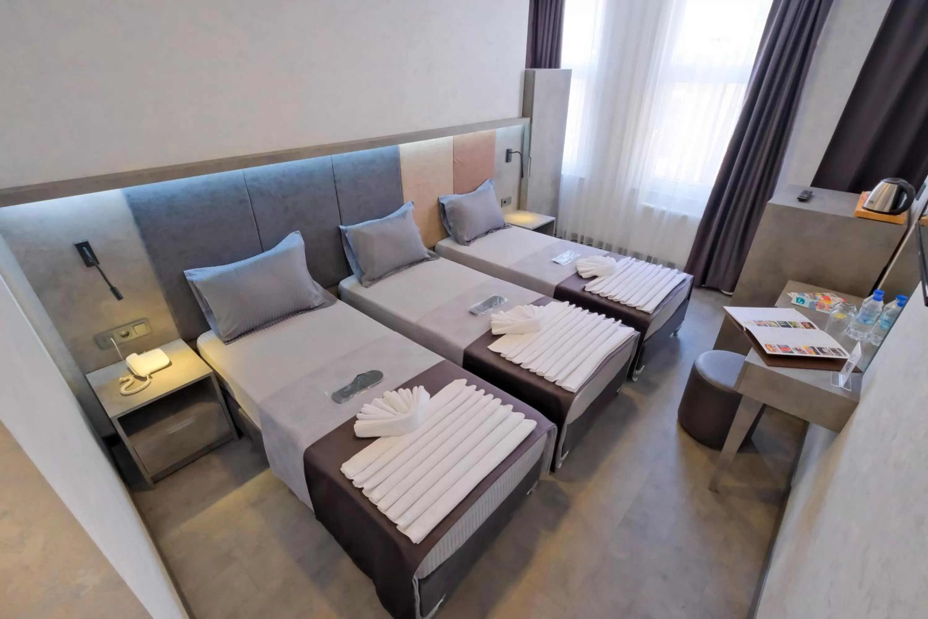 Bed in The Queen Hotel