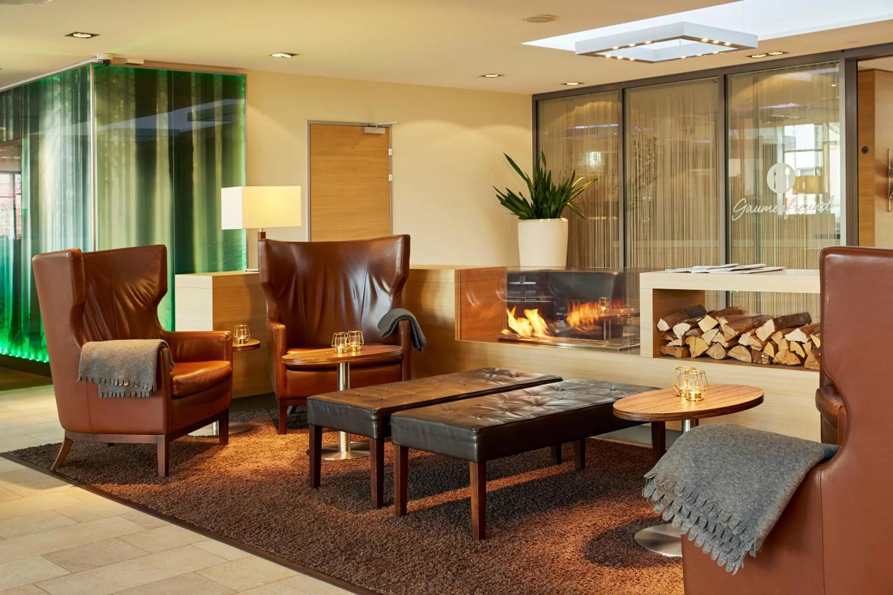 Lobby or reception in H+ Hotel Zürich