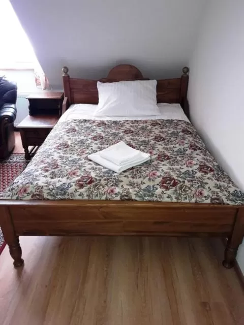 Bed in Gościniec Dworski w Ropie