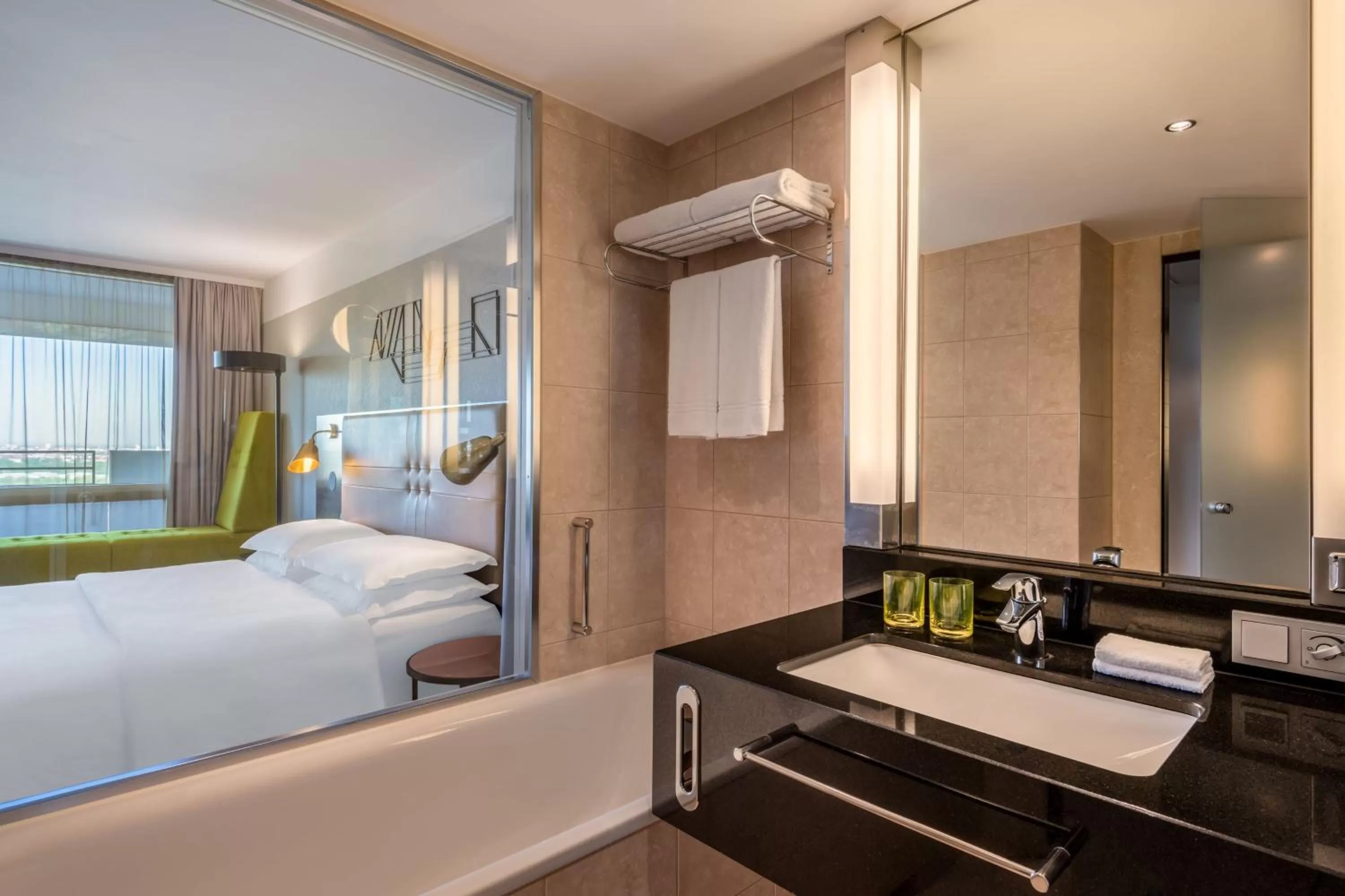 Bathroom, Bed in Four Points by Sheraton Munich Arabellapark