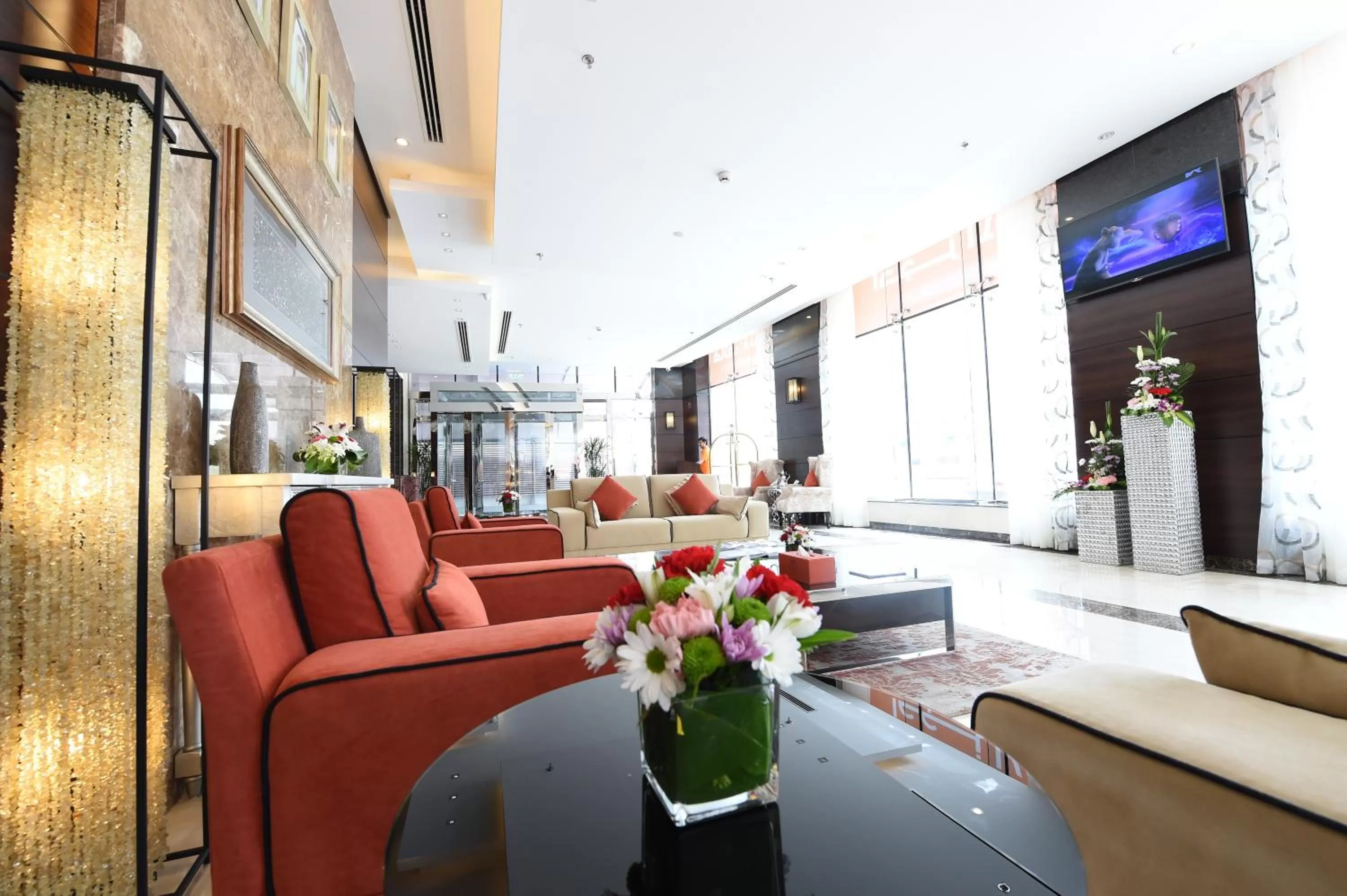 Lobby or reception in Orange Suites Hotel