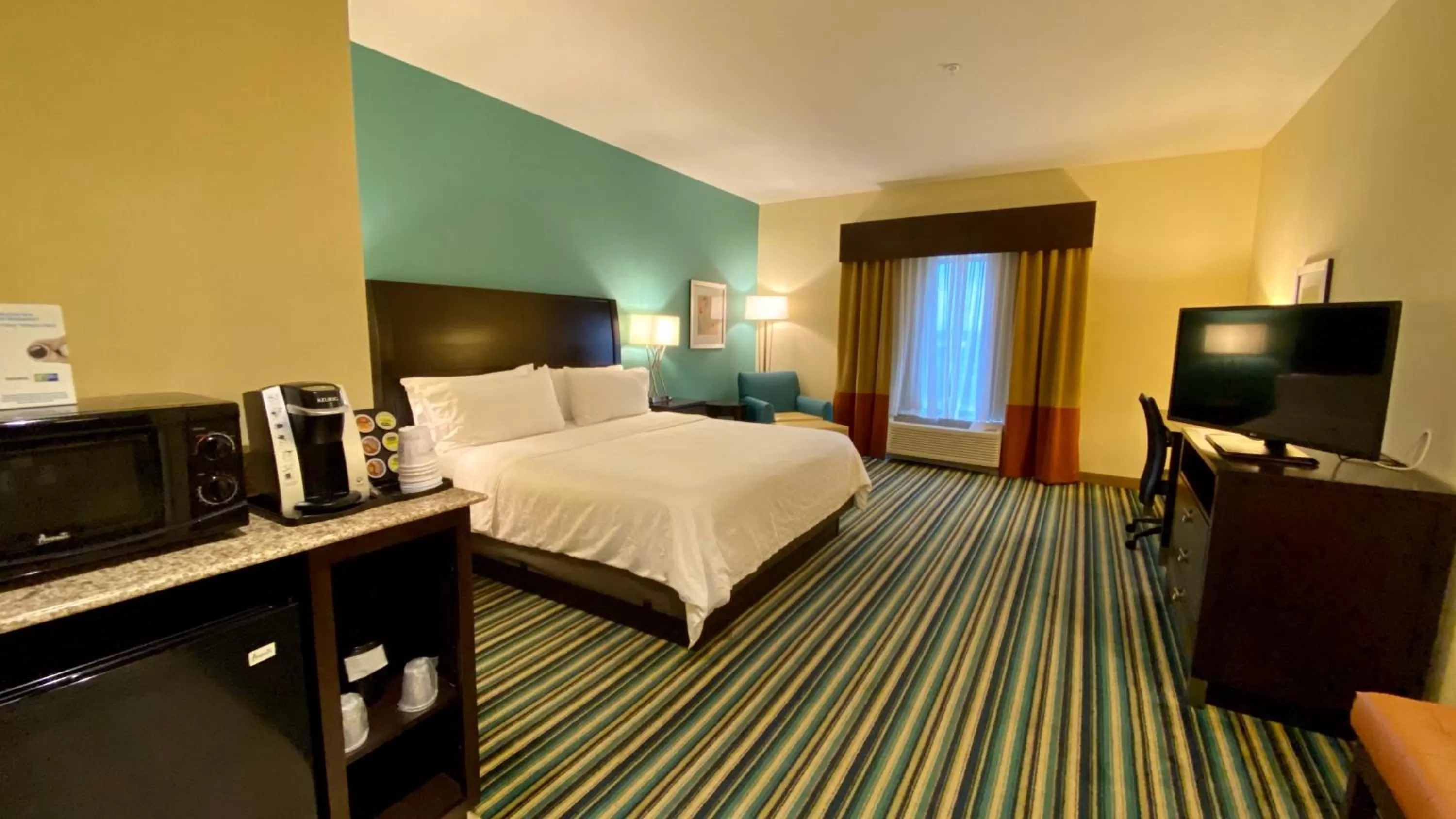 Bedroom, Bed in Holiday Inn Express Hotel & Suites Orlando East-UCF Area by IHG