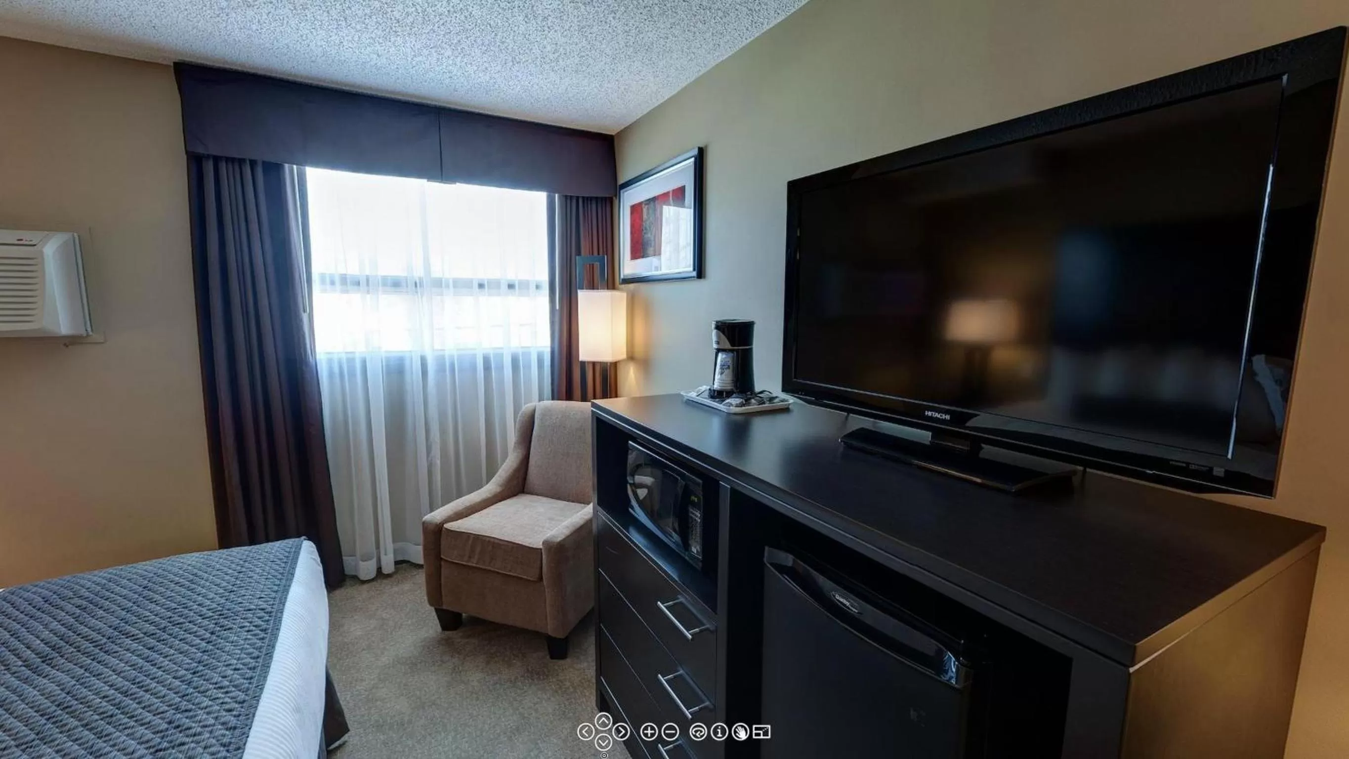 TV and multimedia in Days Inn by Wyndham Calgary Northwest