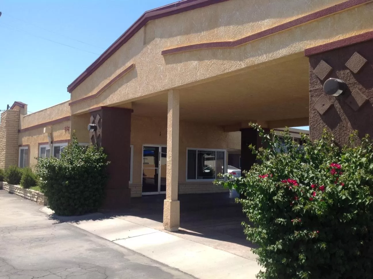 Property building in Americas Best Value Inn Hanford