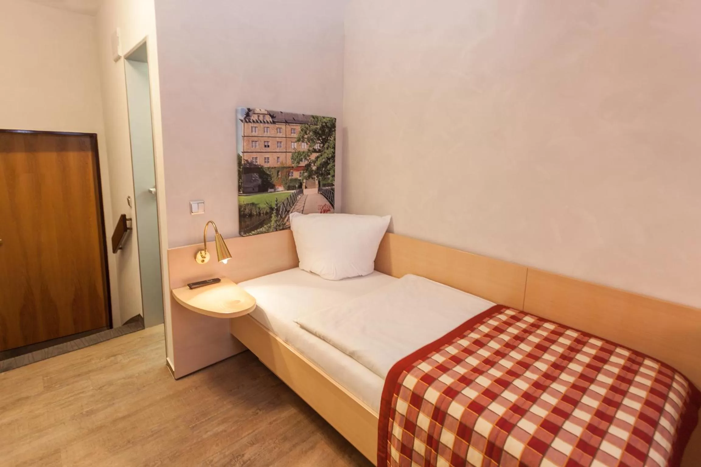 Photo of the whole room, Bed in Centro Hotel Goya Wolfsburg City, Trademark Collection by Wyndham