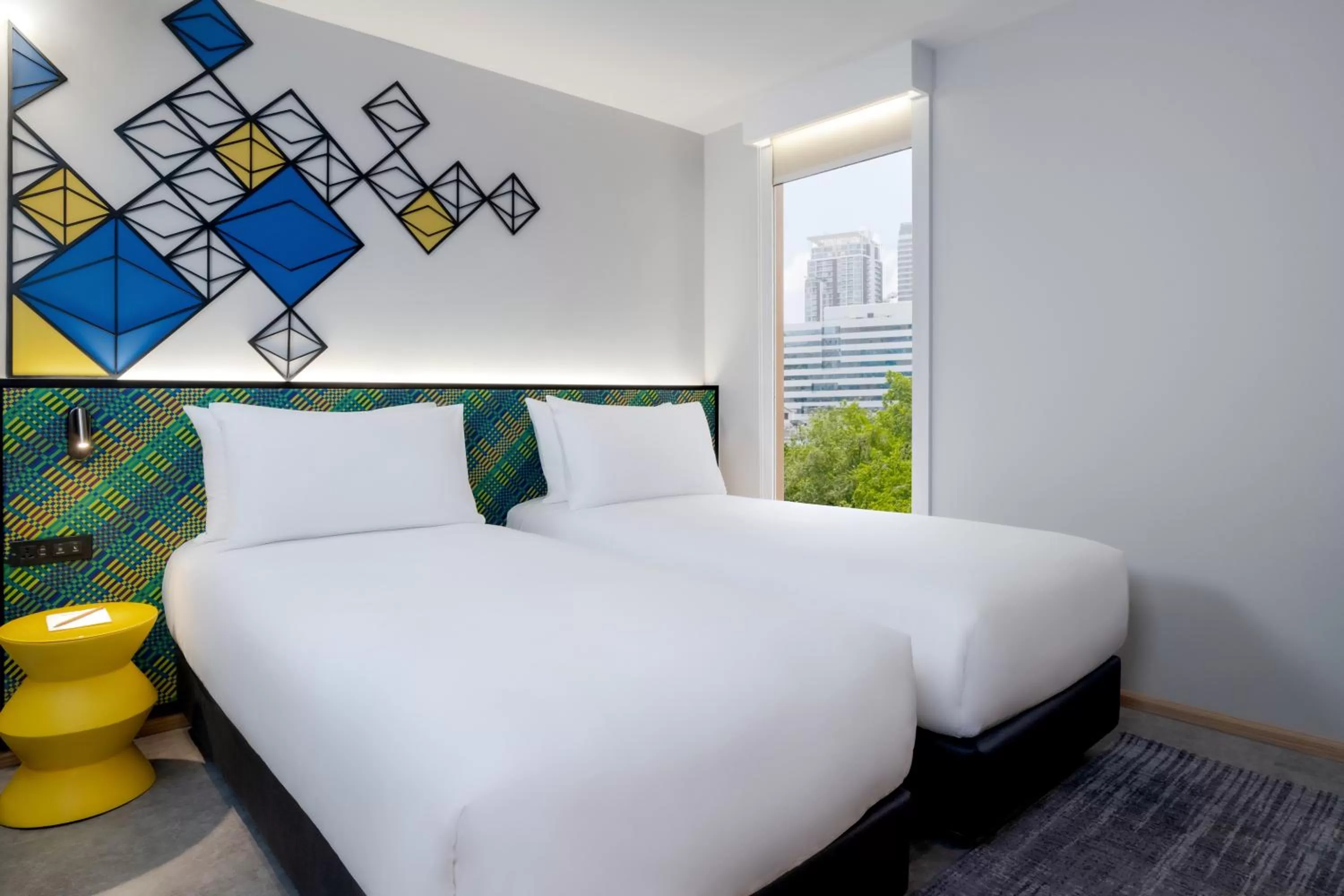 Bed in ibis Styles Bangkok Silom