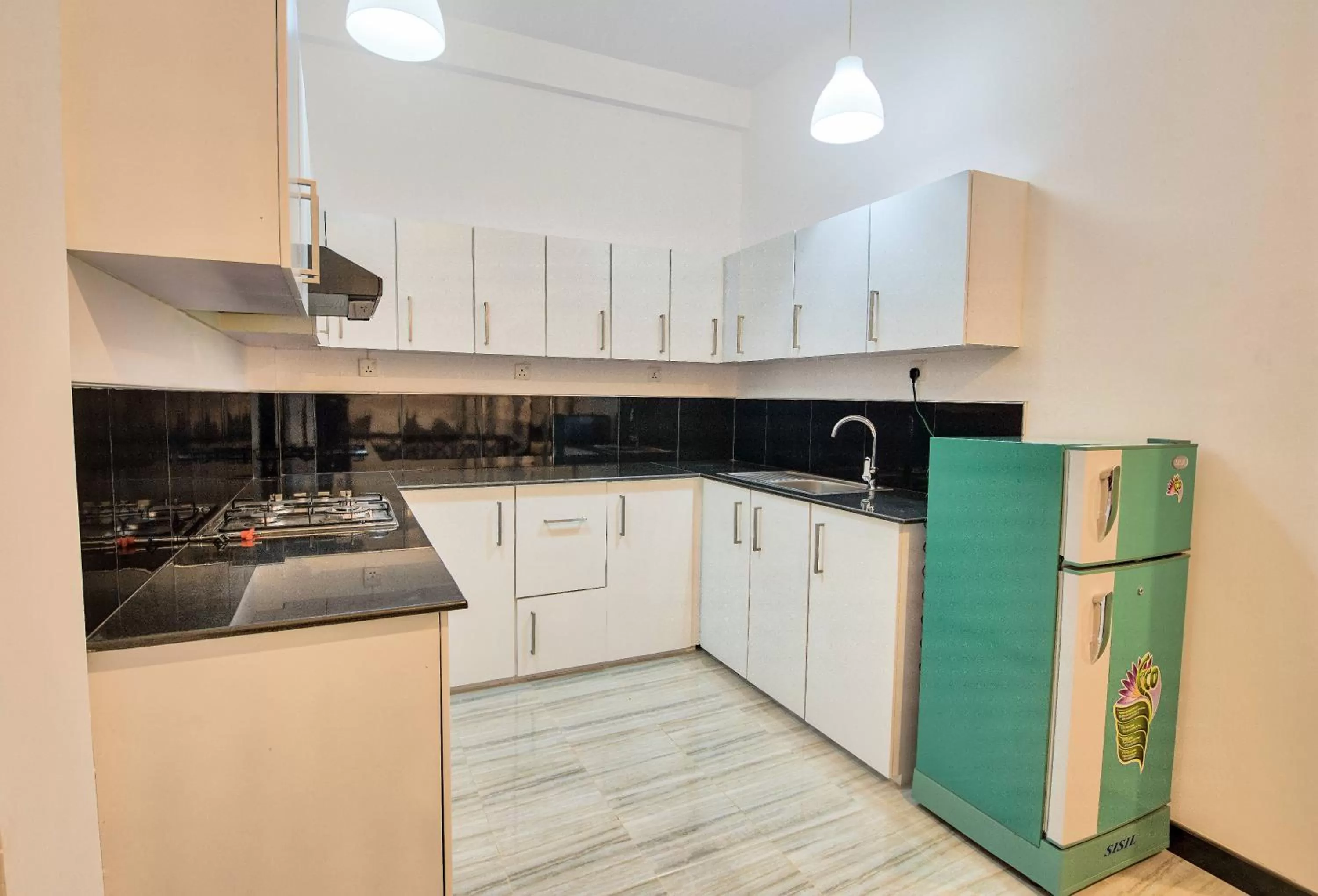 Kitchen or kitchenette, Kitchen/Kitchenette in Ashiyana Hotel