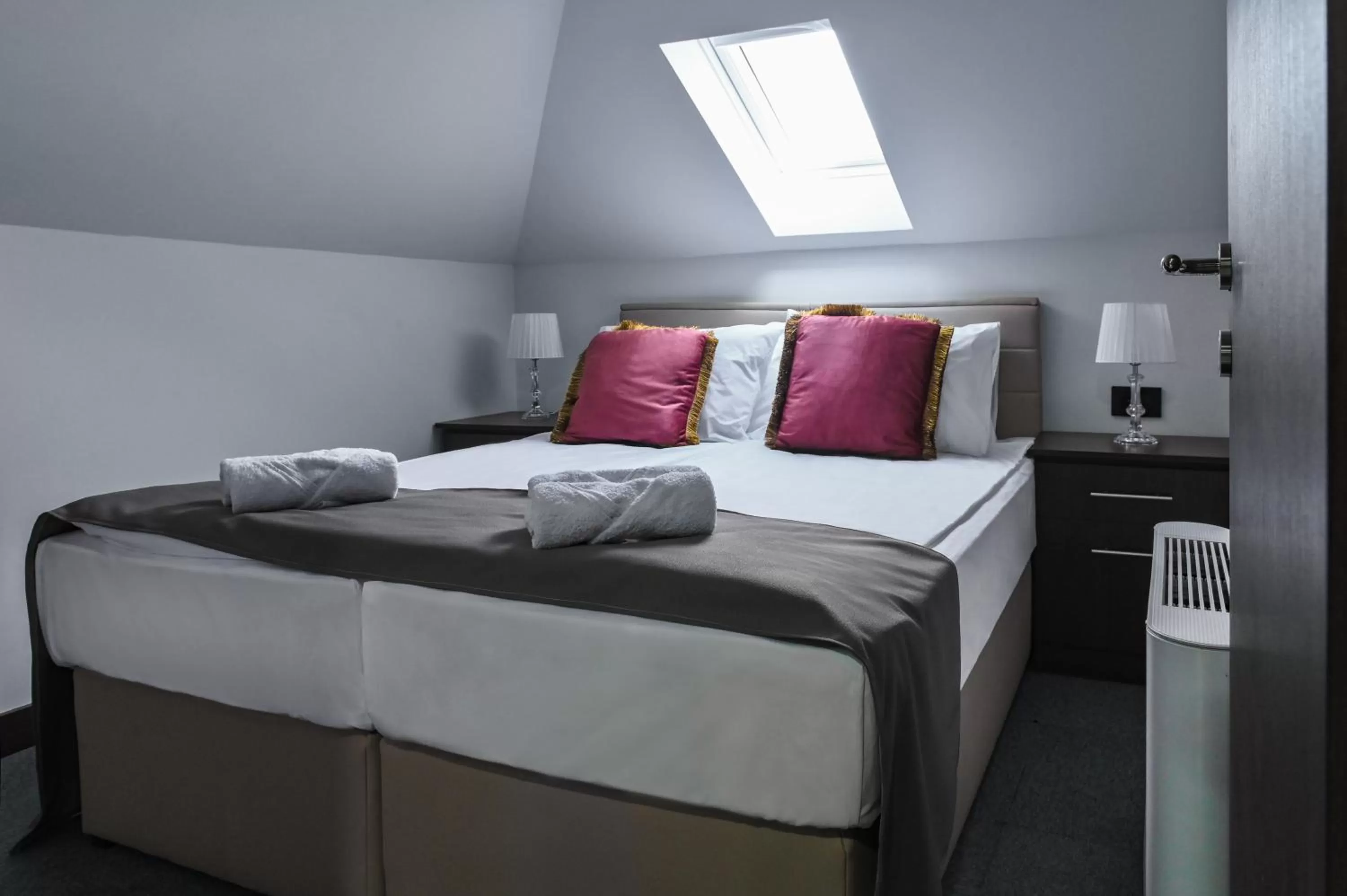 Bed in Garni Hotel Aline