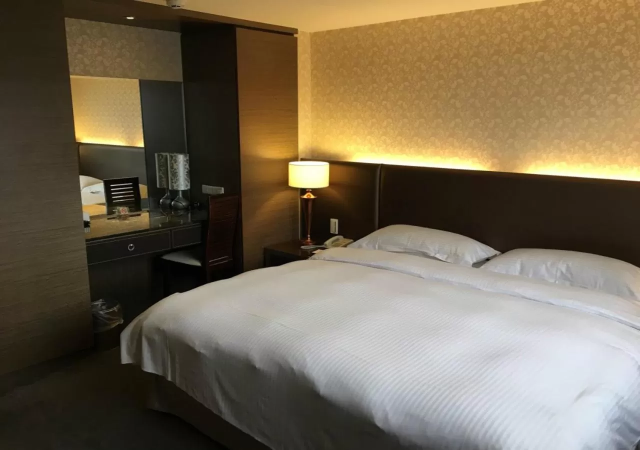 Bed in The Metro Hotel - Taipei Branch