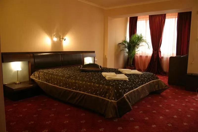 Bed in Troyan Plaza Hotel